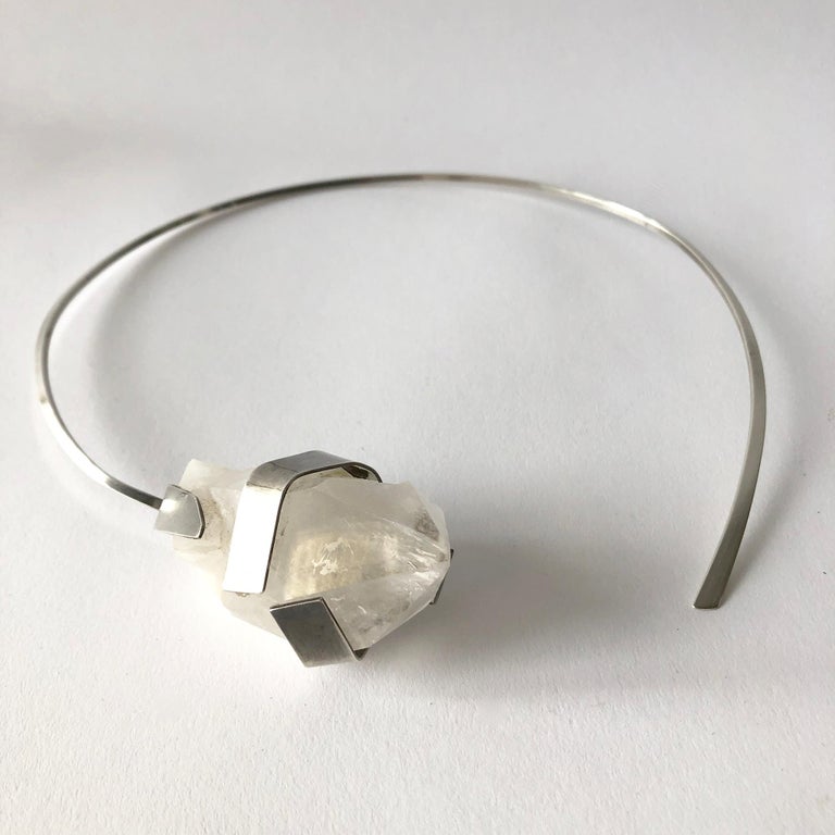 Handmade, one of a kind sterling silver open necklace featuring a raw quartz crystal pendant created by American modernist jeweler Betty Cooke of Baltimore, Maryland.  Necklace measures 20