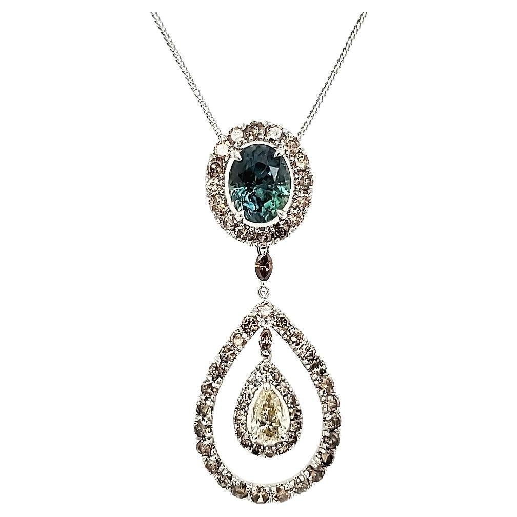 Rare Bi-colored Blue-Green Sapphire pendant with diamonds For Sale