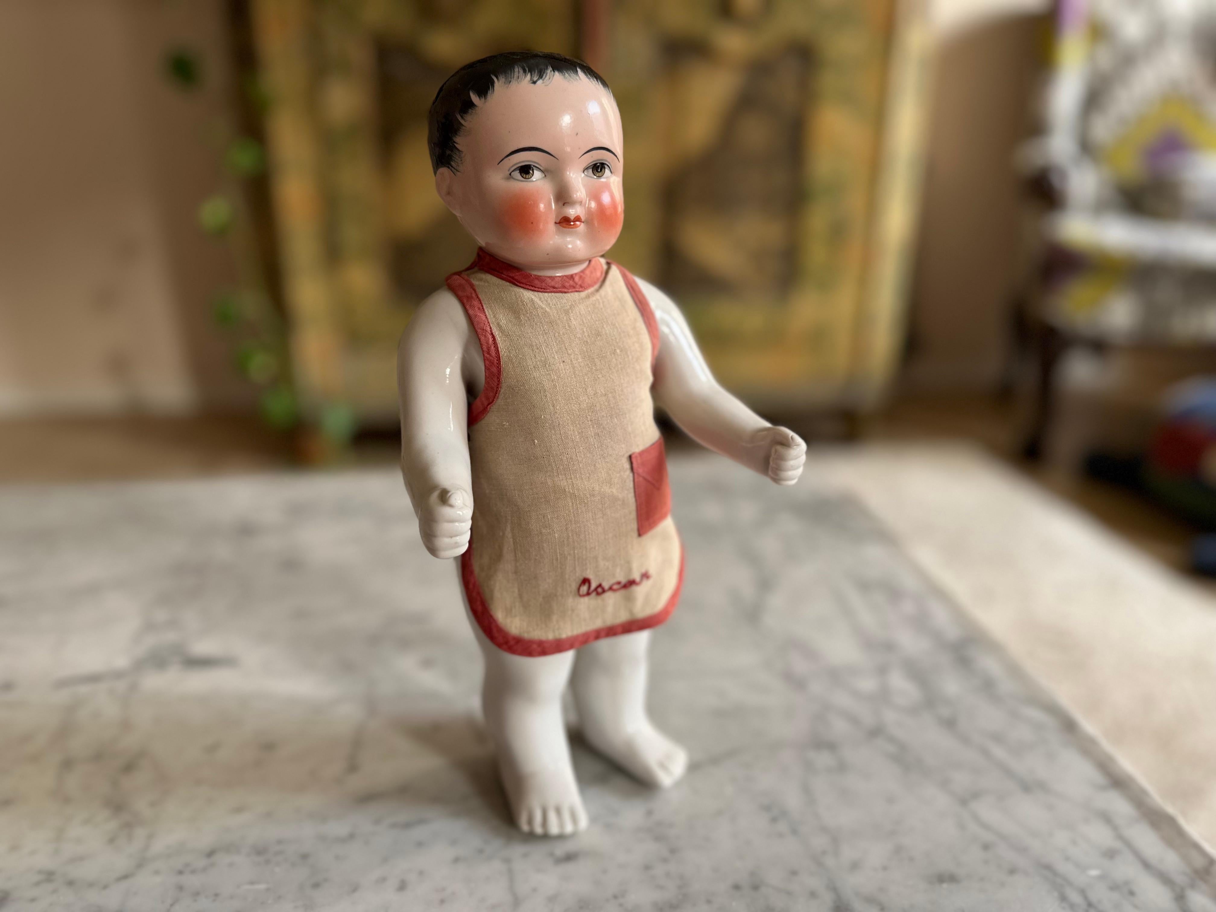 This exquisite Biedermeier porcelain bathing doll, dating back to around 1820, is a fascinating piece of early toy history. During the 19th century, these dolls were used as floating bath toys for children, despite their delicate and fragile