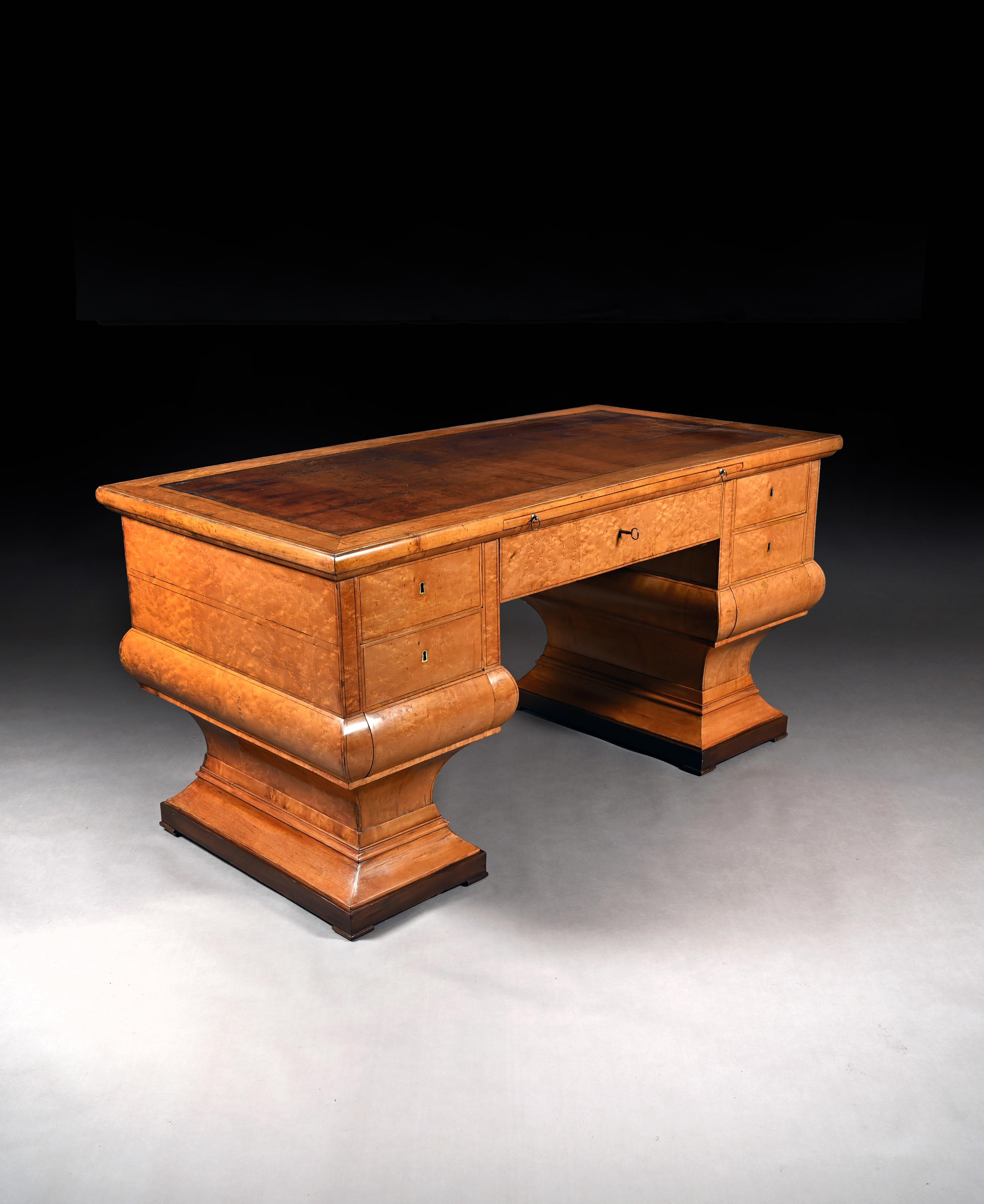 An exquisite freestanding figured maple wood and ebony desk of neoclassical form in the manner of Josef Danhauser. 

Origin: Austrian, Vienna, circa 1820, Biedermeier period.

Provenance: Private European collection, originally purchased from
