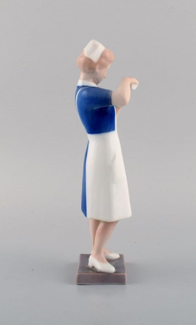 Danish Rare Bing & Grøndahl Porcelain Figurine, Nurse, Model Number 2379 For Sale