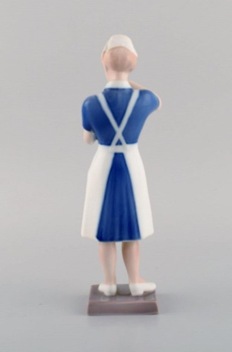 Hand-Painted Rare Bing & Grøndahl Porcelain Figurine, Nurse, Model Number 2379 For Sale