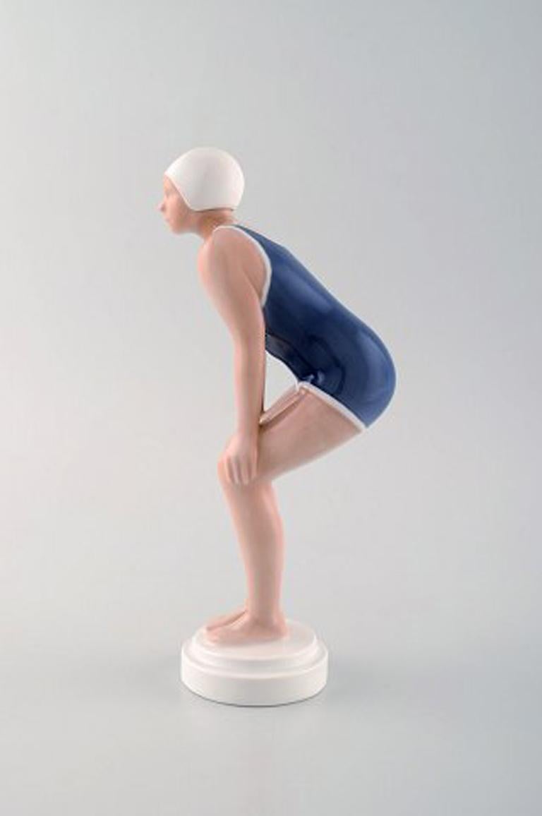 Rare Bing & Grondahl / B&G Art Deco figure in porcelain. Swimming girl, circa 1930. Model number 2224.
In perfect condition.
Measures: 21 x 8.5 cm
Stamped.