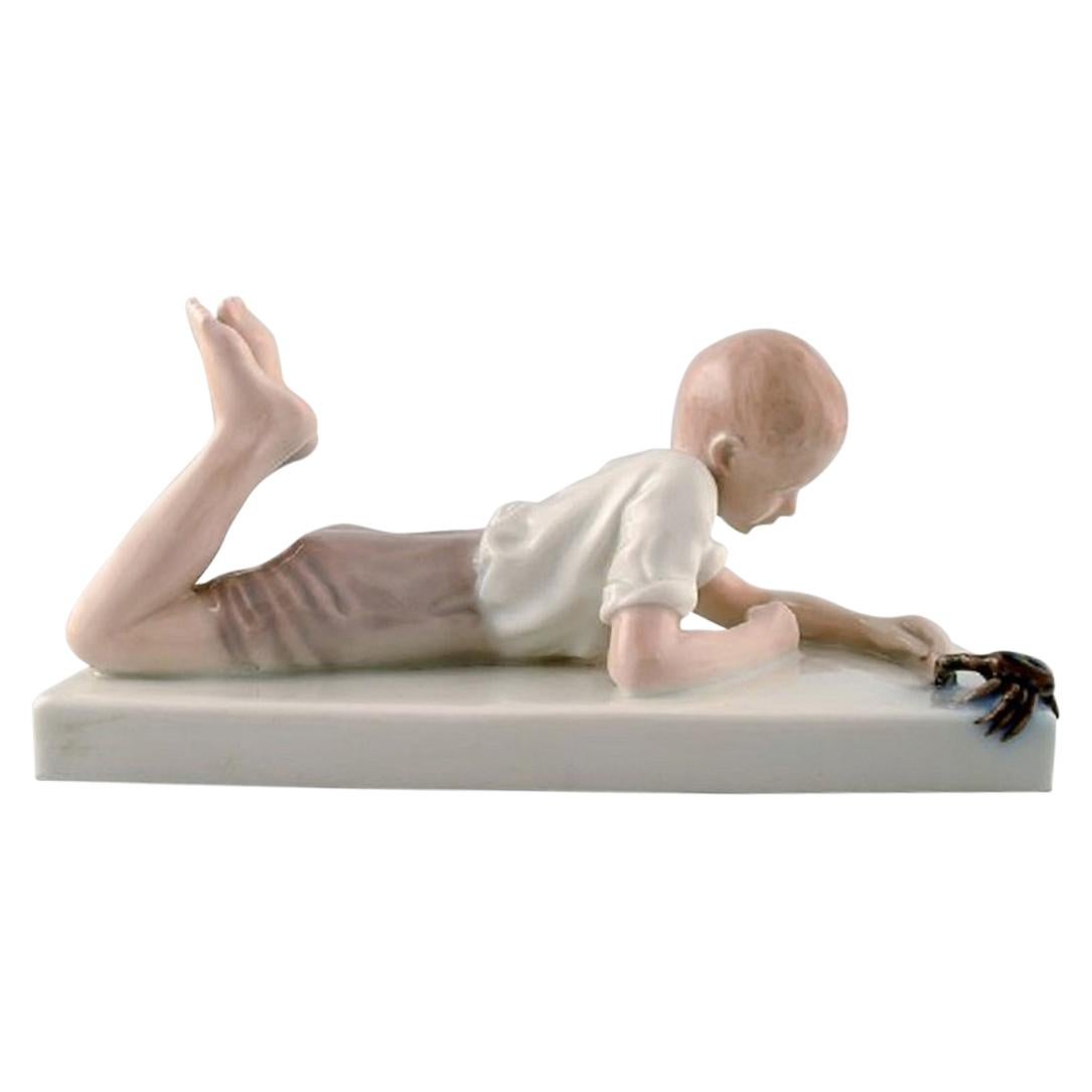 Rare Bing 
Grondahl / B&G Art Nouveau Porcelain Paper Weight, Boy with Crab