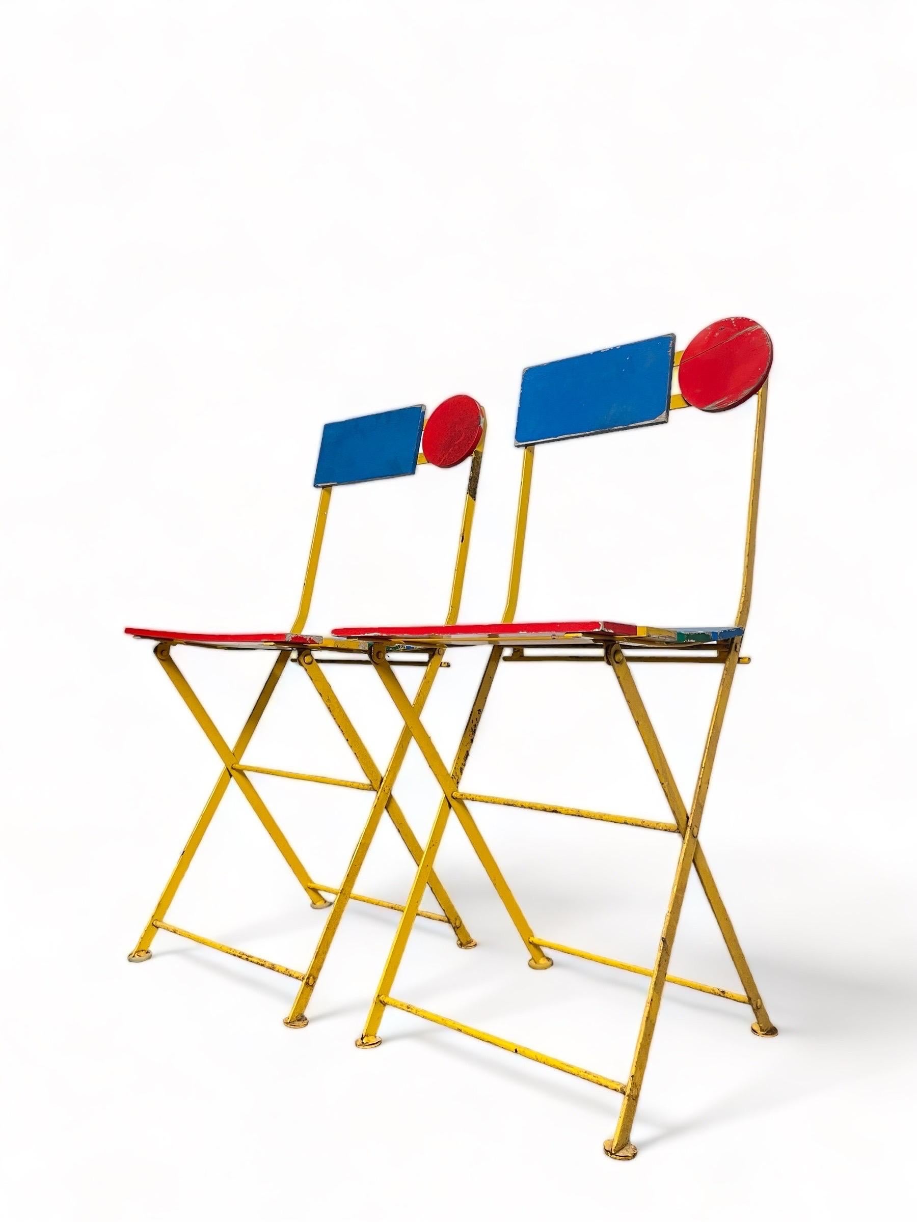 Rare Postmodern Bistro Chairs by Denis Balland For Fermob France


Folding chairs rare hard to find, Lacquered steel frame, seat and back of lacquered wood slats. Designed by Denis Balland for Fermob, France, c. 1985. Great as a side chair it is a