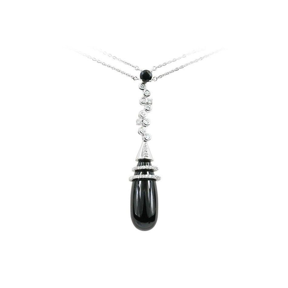 Necklace White Gold 14 K 

Diamond 10-RND-0,16-F/VS2A 
Diamond 12-RND-0,04-G/VS2A 
Black Agate 1-14,47ct
Black Agate 1-0,25ct

Weight 9.88 grams
Length 45 cm

With a heritage of ancient fine Swiss jewelry traditions, NATKINA is a Geneva based
