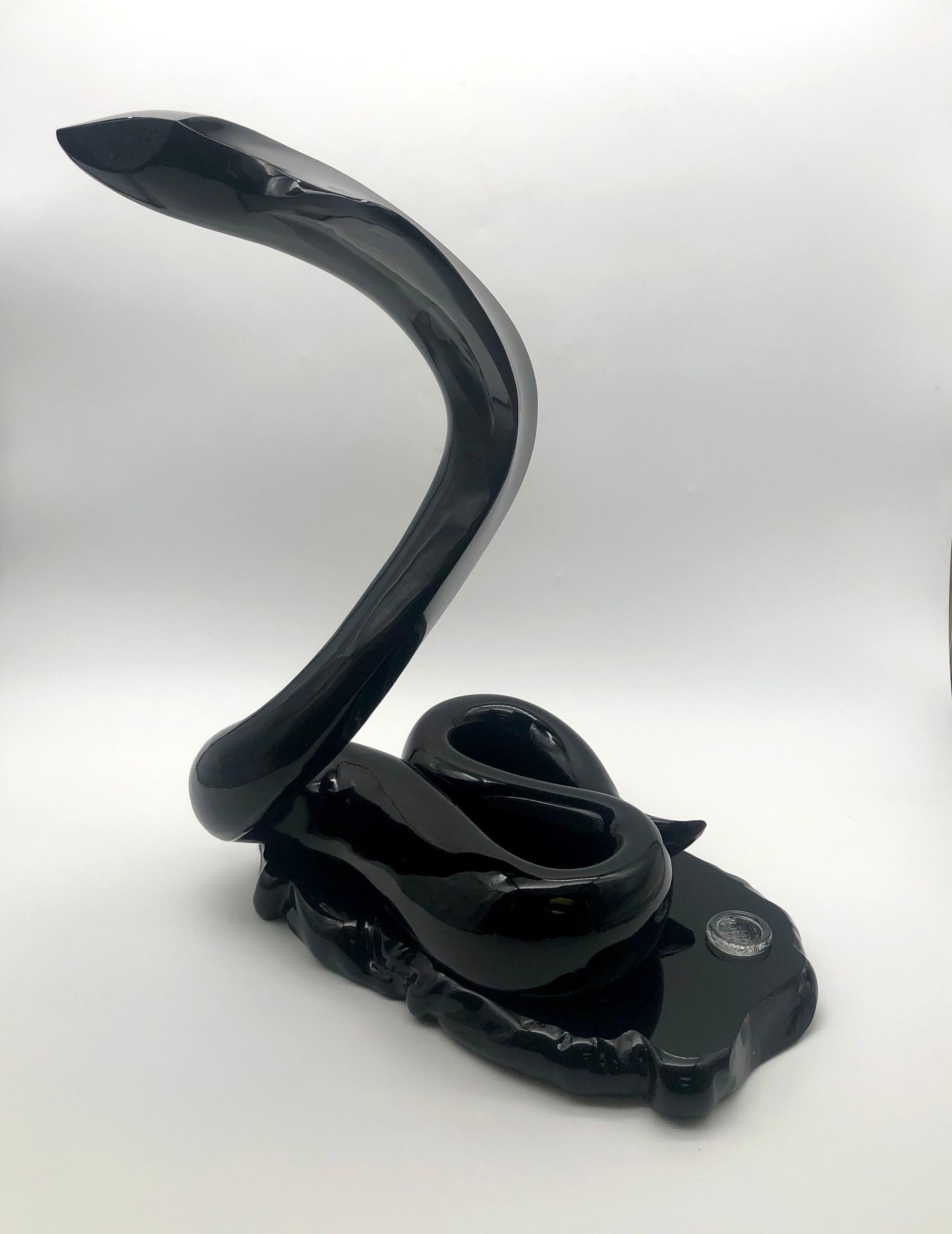 Never Seen Before, Rare Edition of Cubic Black Glass King Cobra on Rock with Seal and Authenticity Card; by Loredano Rosin, circa 1975.

Loredano Rosin was an Italian sculptor best known for his traditional use of Murano glass to depict stylized
