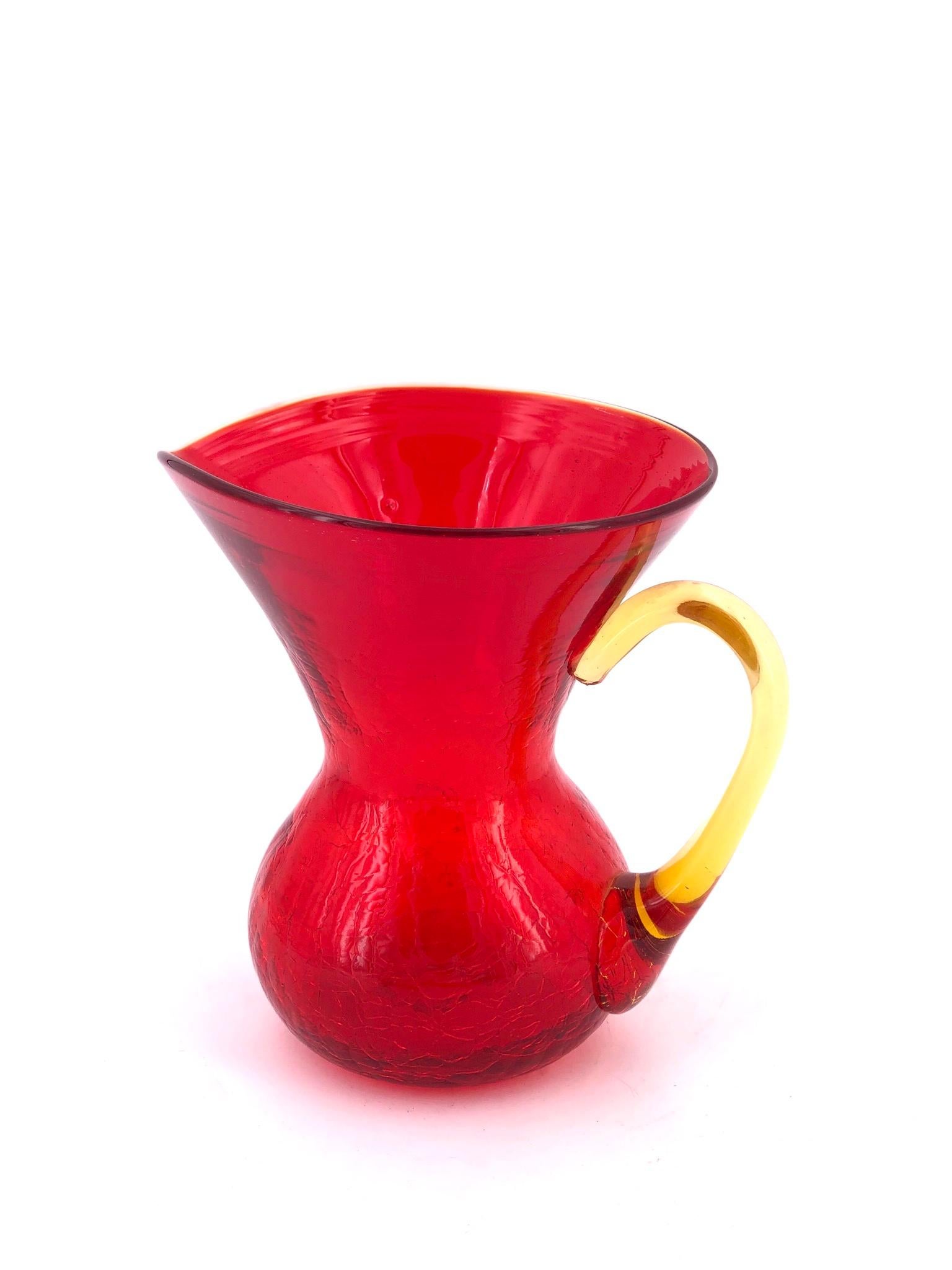 Beautiful colors excellent condition on this petite crackle glass amberine pitcher.