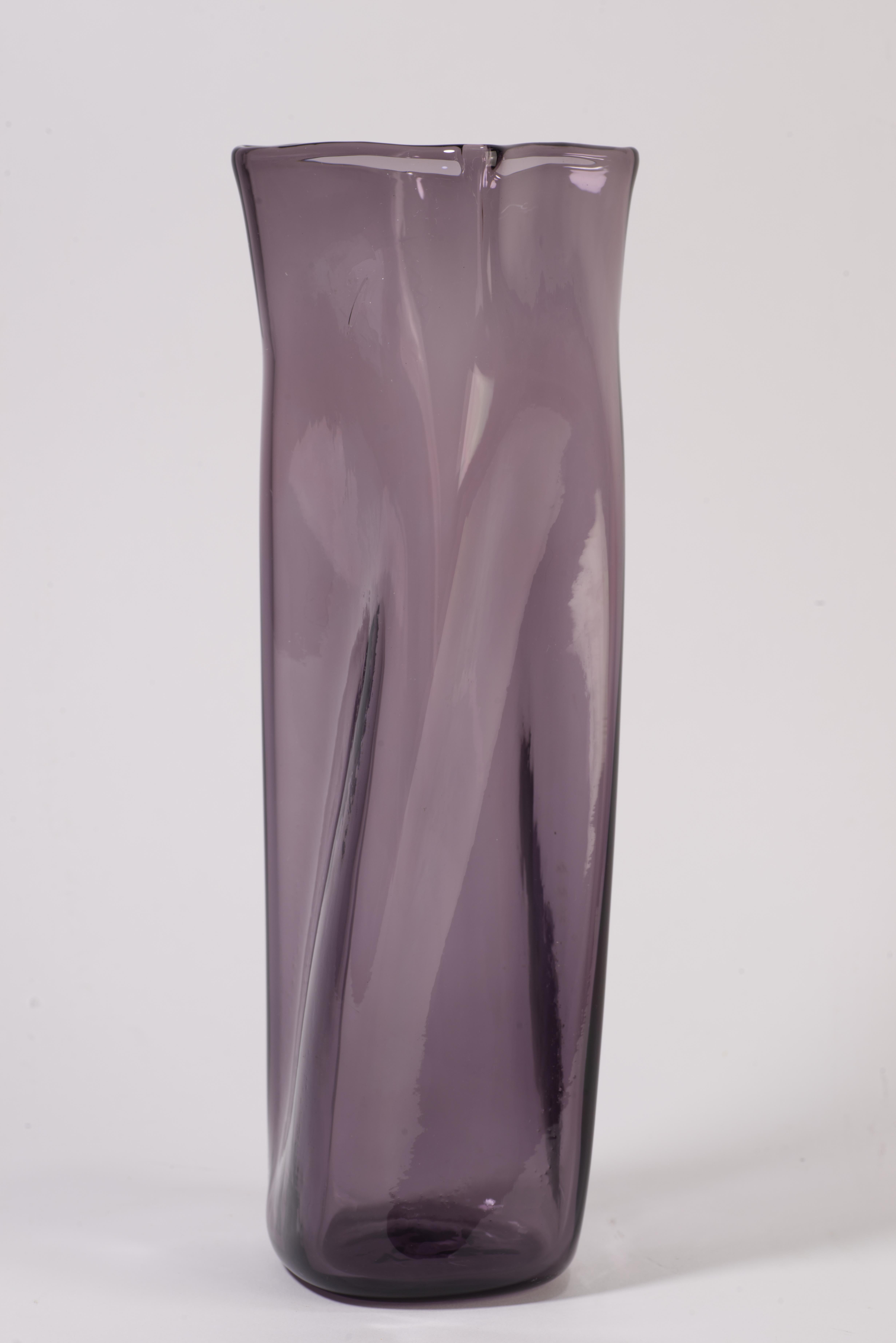  Rare hand-blown sculptural vase was created by Blenko in Lilac color; Lilac was produced in 1959-1960.

The vase is signed with sandblasted large Blenko logo on the bottom that was used from the Spring of 1958 to Summer of 1961.