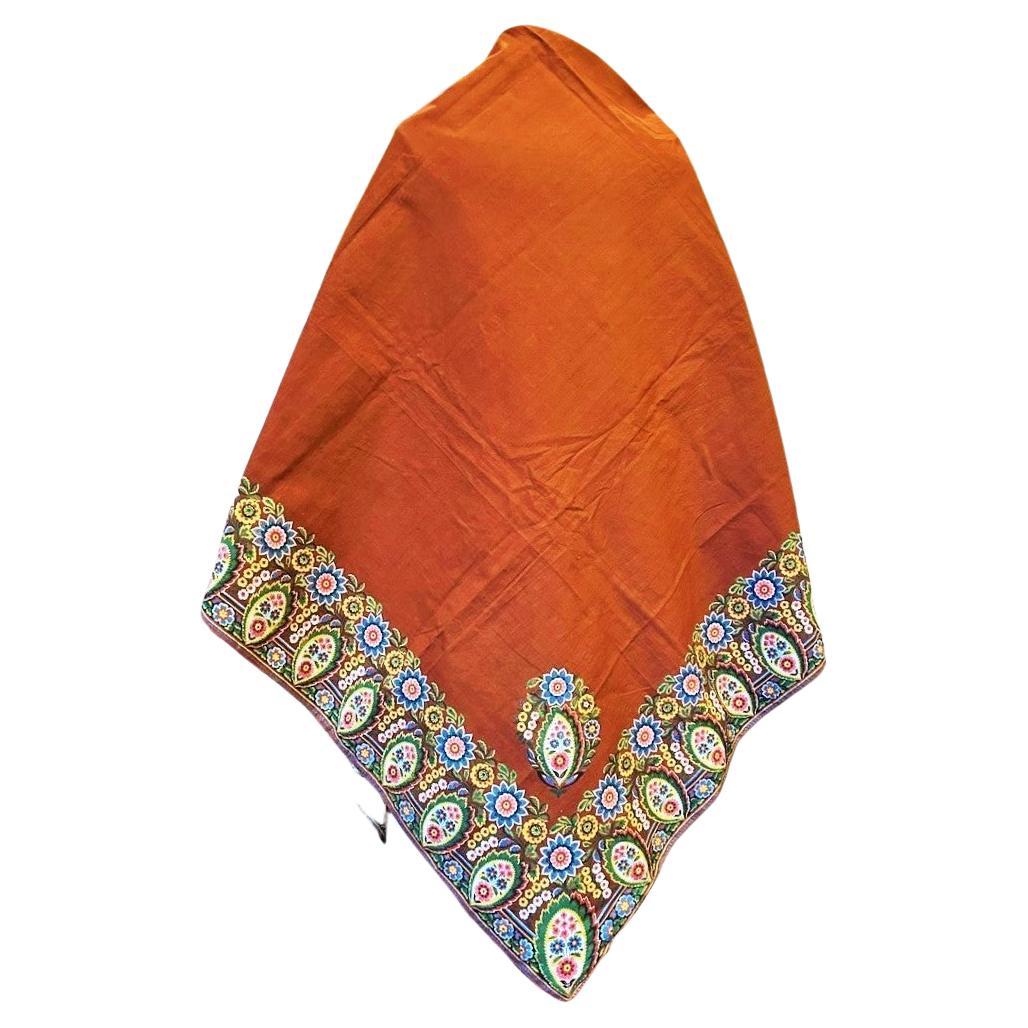 Circa 1810-1830
France
A woodblock printed cotton shawl with a buff brown background, probably from an unidentified Alsatian manufacture and dating from the end of the First Empire or Restoration period. Eight-colour printing on a fine, tightly