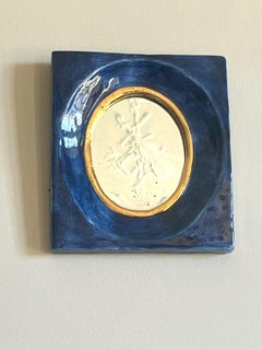 Raro specchio in ceramica smaltata blu e dorata, "Amélie" 1949 Mithé Espelt