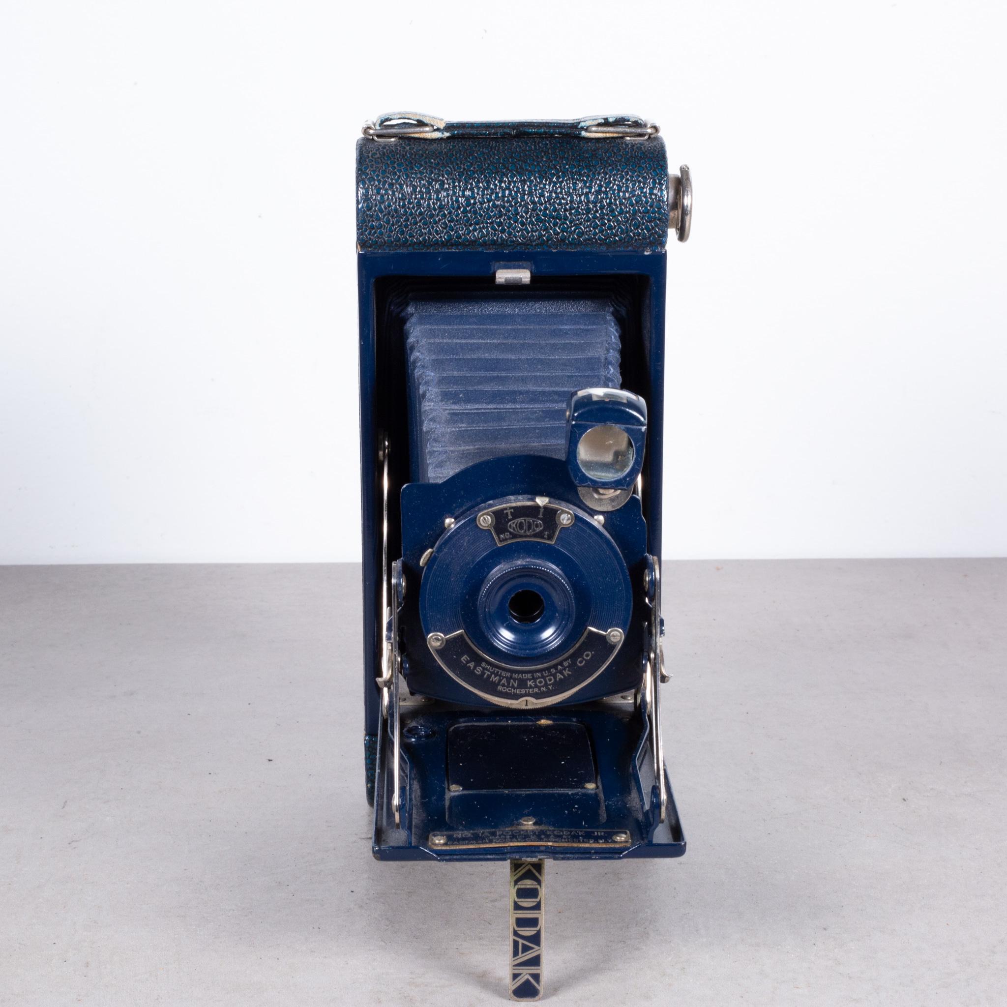 About

This is an original Eastman Kodak 1A Jr. folding camera with the hand triggered shutter release. The body of camera is all leather with a pop out view finder and it folds smoothly closed to 1.25 inches. Original blue leather case.
