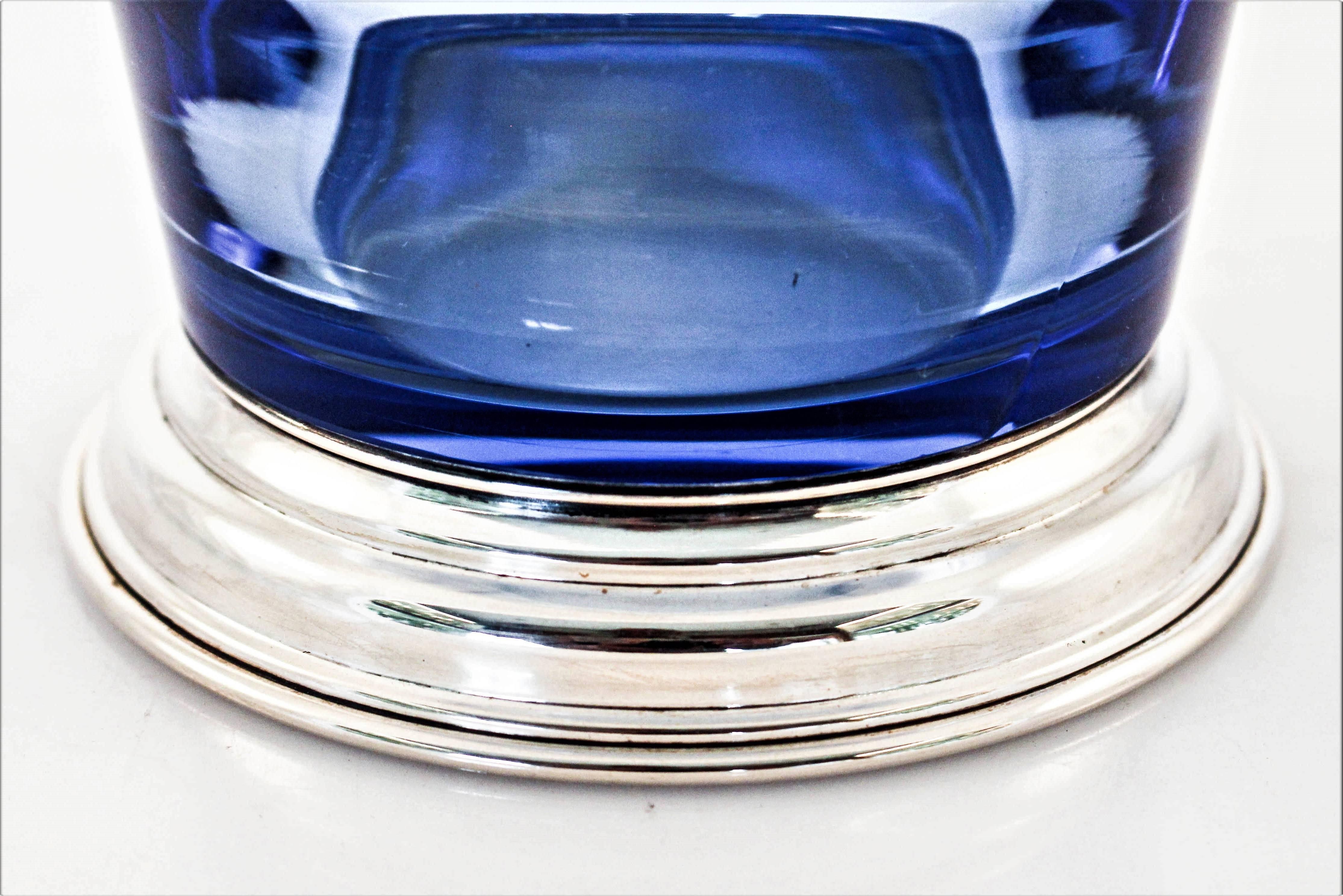 We have neither seen nor had a vase with this color before; a cobalt blue on the bottom and a lighter shade of blue towards the top. The talented people at the world renowned Hawkes Glass Company made it so that the blue gets lighter in color as you