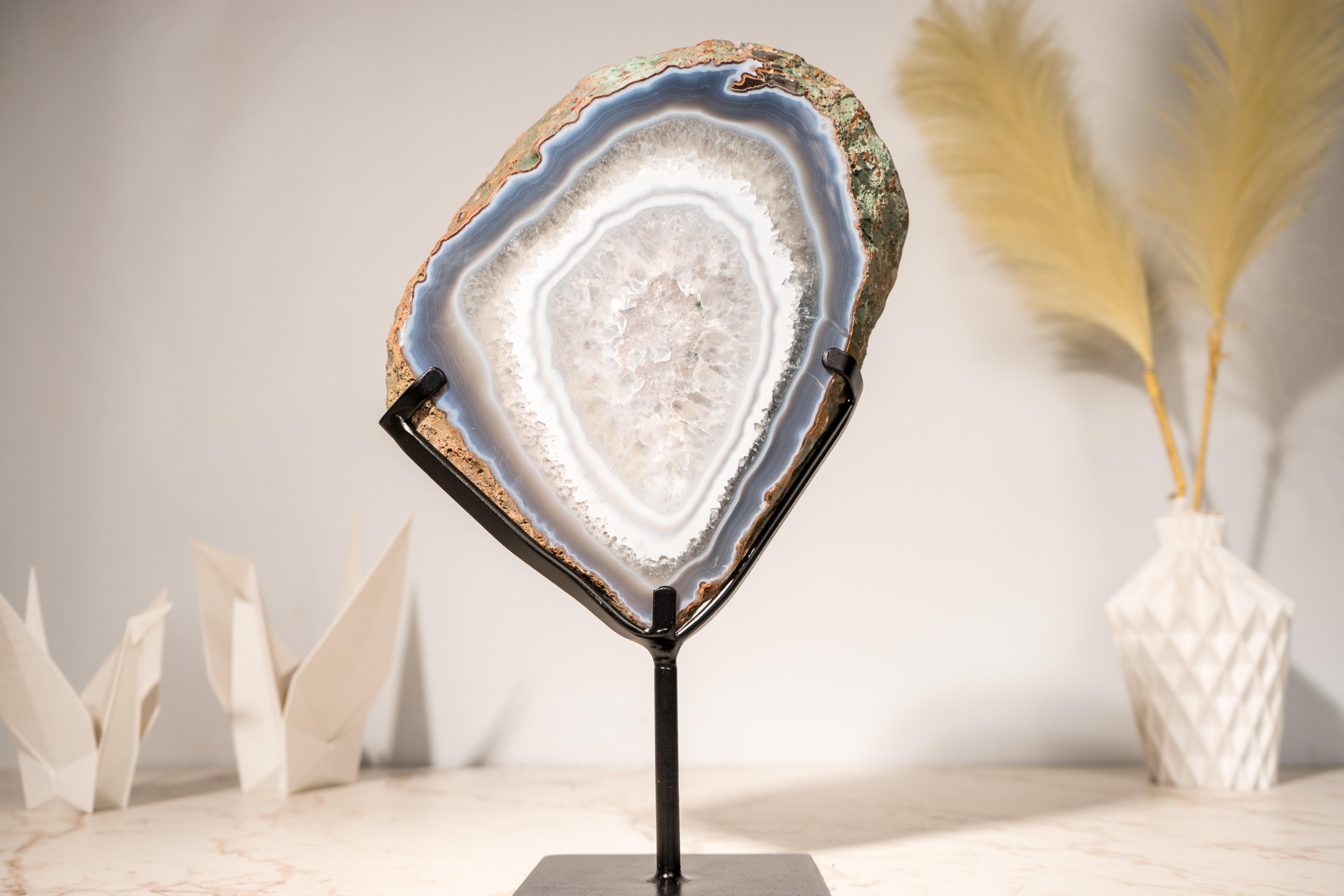A Superb Specimen of Agate: All-Natural Agate Slice with Rare Banding Patterns and Composition

▫️ Description

With an extraordinary growth pattern that defies logic, this rare agate slice showcases a unique crystal layer formed between its natural