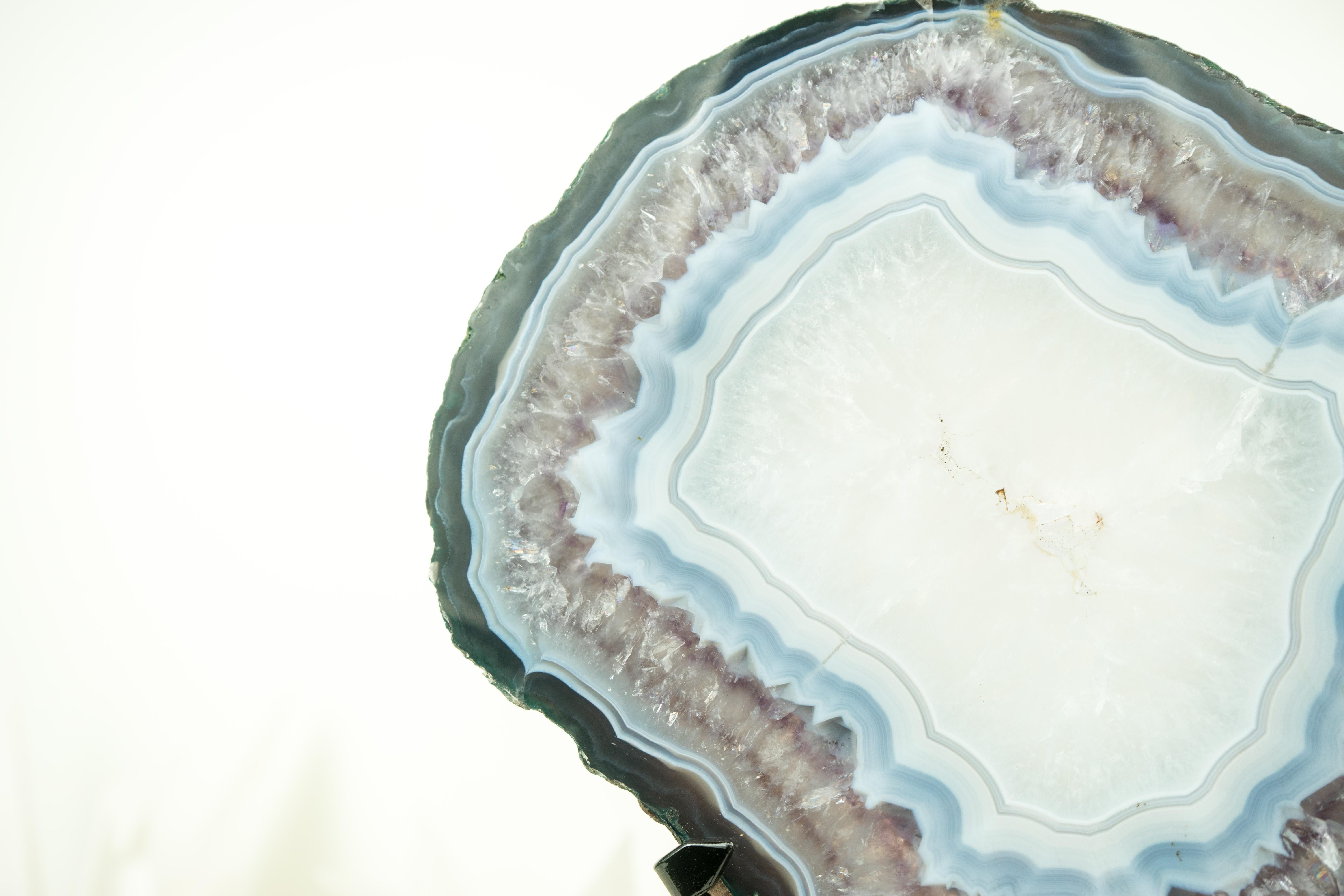 Natural Agate Slice with Stunning Banding Patterns, Natural and Undyed

▫️ Description

With an extraordinary growth pattern, this agate slice defies logic, leading to an intriguing question: How could a crystal layer develop between the agate's