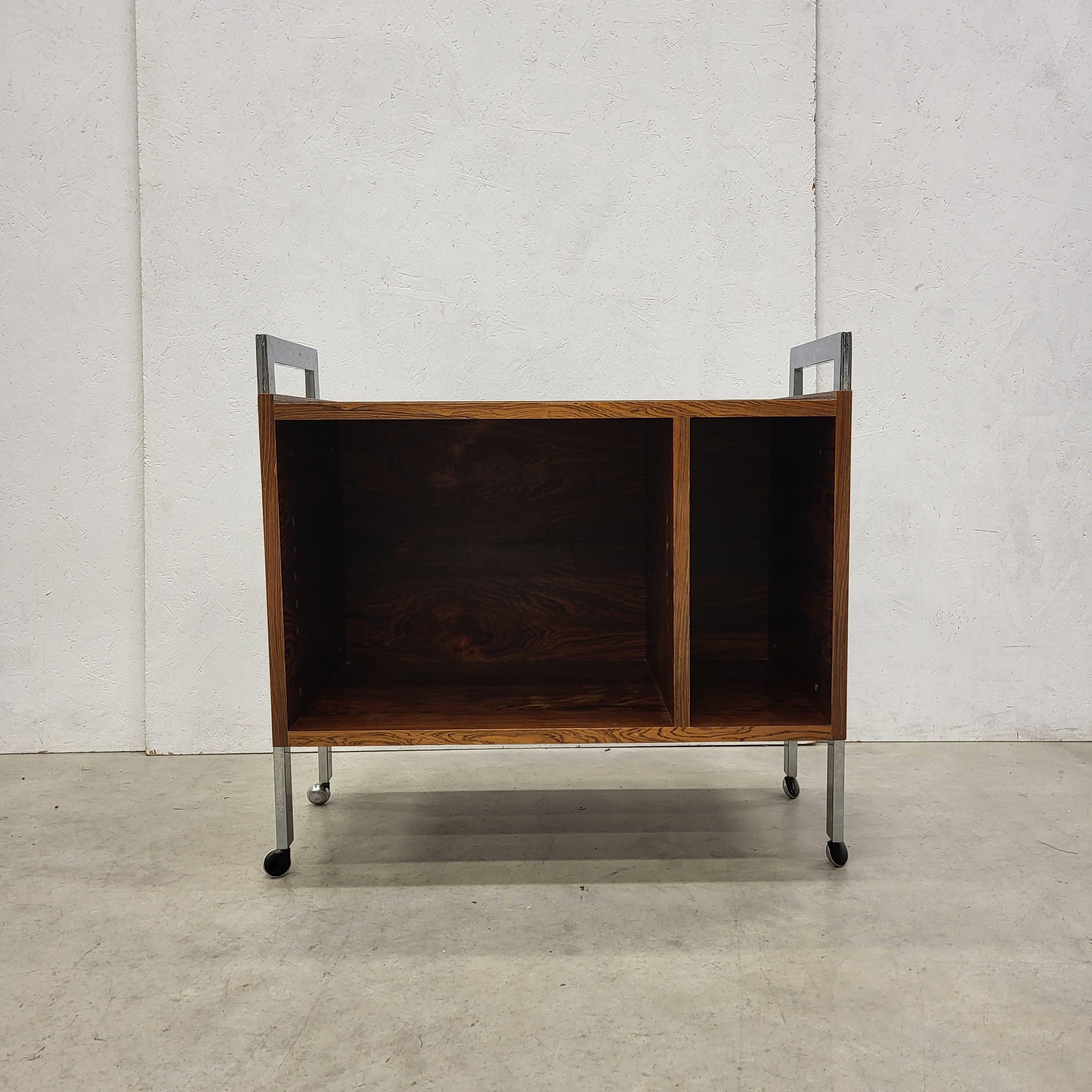 Rare midcentury cabinet trolley by Bodil Kjaer for E. Pederson Son.
Designed in 1959 and made in Denmark in a very low production line in the late 50s, early 60s.

Impressive veneer & wood structure. Stunning piece!
Reduced design made with highest