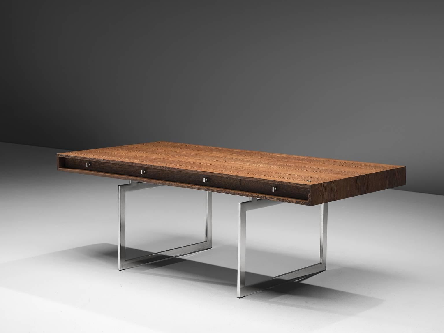 Bodil Kjaer for E. Pedersen & Søn, table model 901, wenge and chrome steel, Denmark, 1959.

This free-standing desk in wenge is designed by the Danish designer Bodil Kjaer. The desk can be used with multiple purposes, as a writing table, desk or