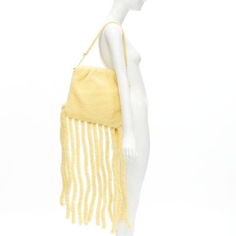 rare BOTTEGA VENETA Daniel Lee Runway beige shearling fringe crossbody clutch
Reference: TGAS/C01519
Brand: Bottega Veneta
Designer: Daniel Lee
Collection: 2020 - Runway
Material: Shearling
Color: Beige
Pattern: Solid
Closure: Clasp
Lining: 