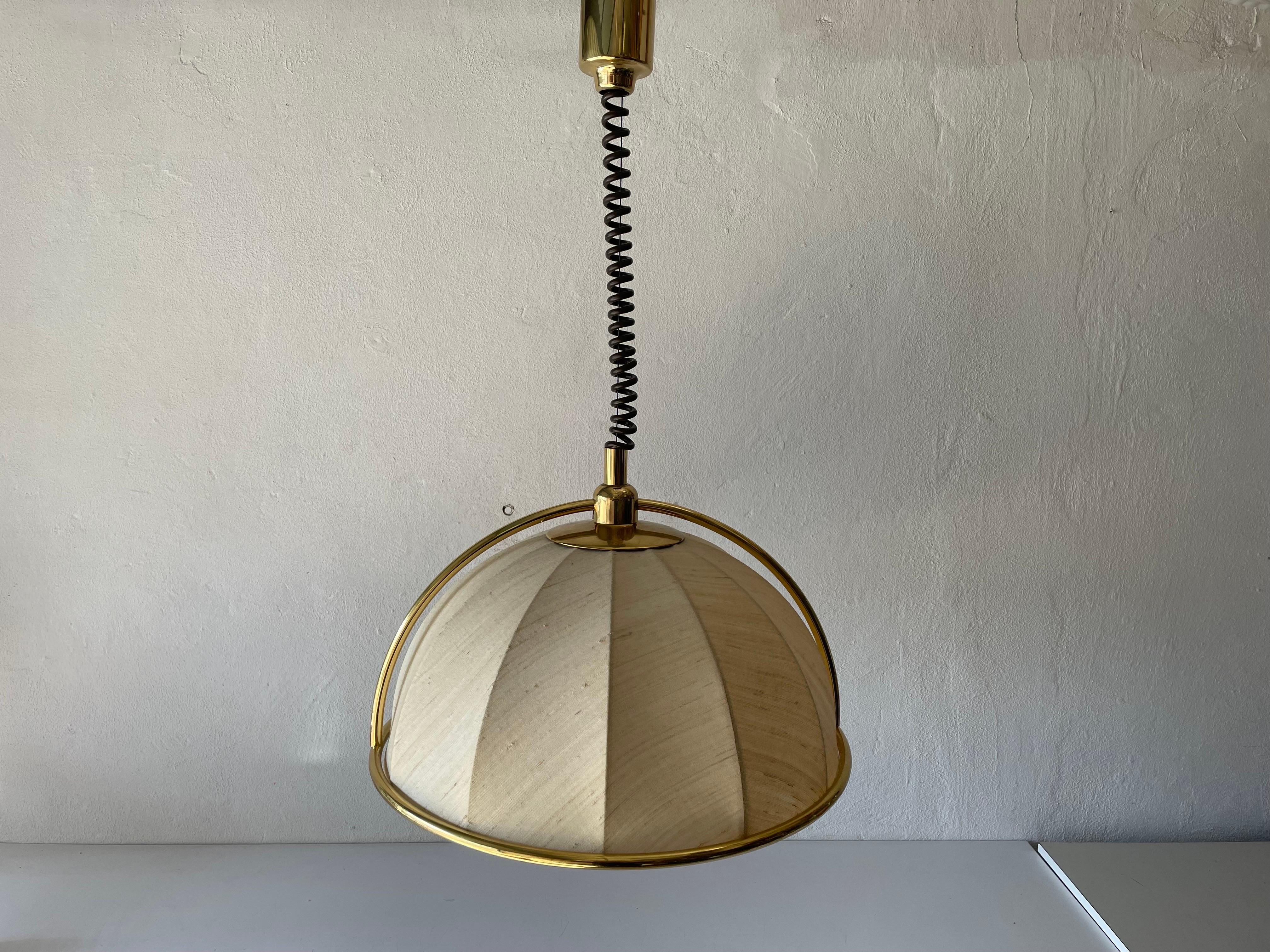 Rare brass & fabric shade pendant lamp by WKR, 1970s, Germany

Adjustable large lampshade.

Brass body & fabric shade
Manufactured in Germany

This lamp works with 3 x E27 light bulbs.

Measures: 
Shade diameter and height: 52 cm and 30