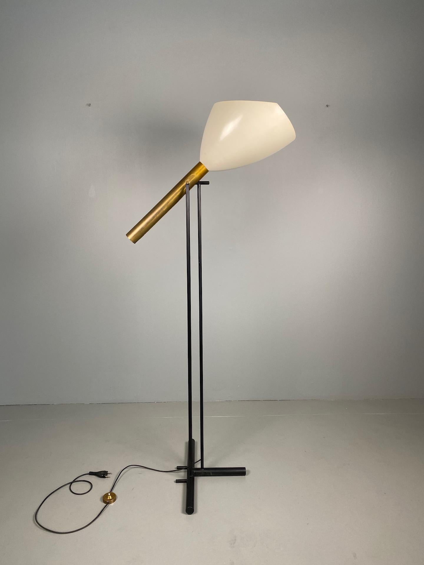 Rare original floor lamp for Arredoluce, 21st century, often attributed to Angelo Lelii in good and original condition, some light rust is visible on the ground part of the base.