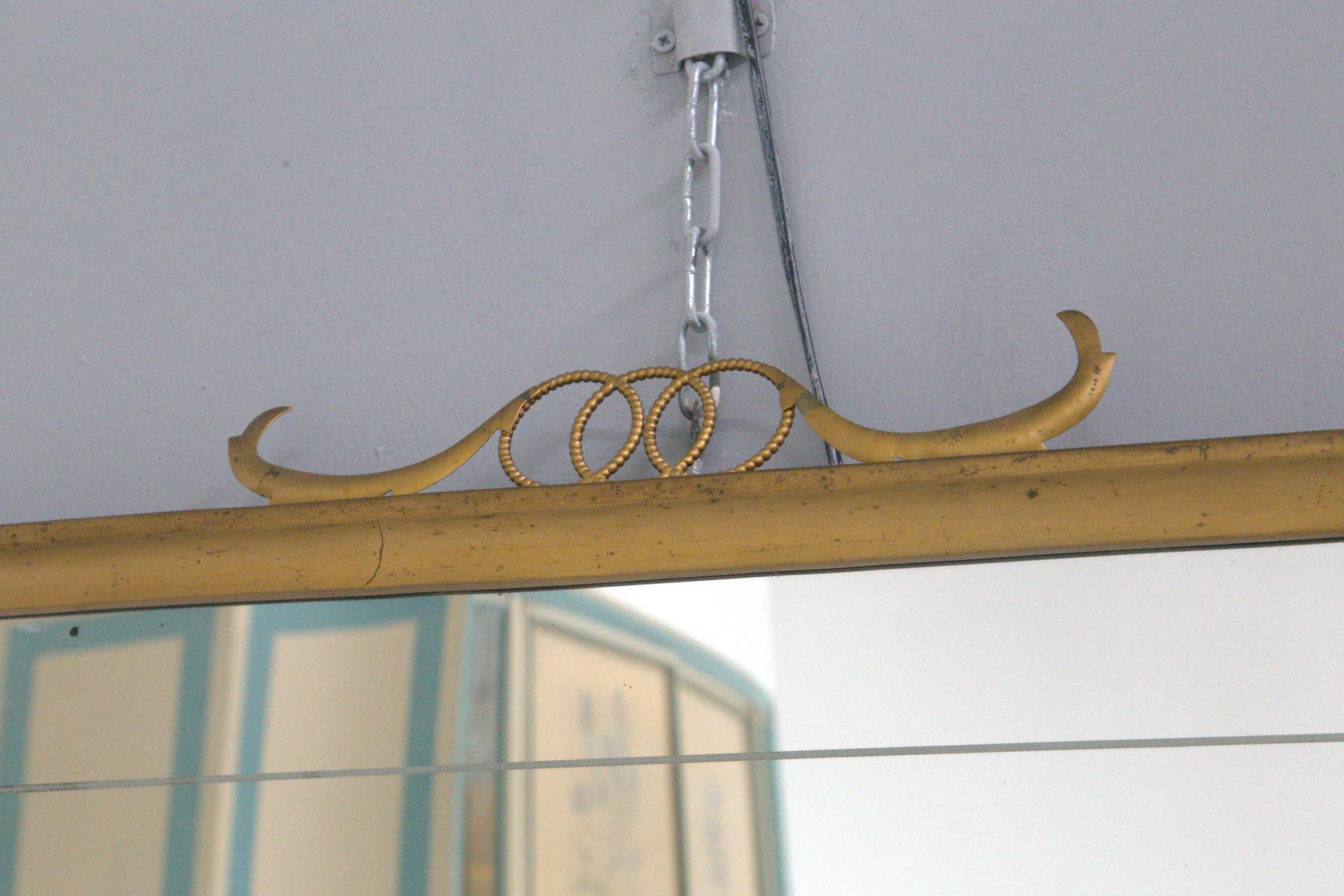 Brass Rare brass mirror by Paolo Buffa, with cornocopies