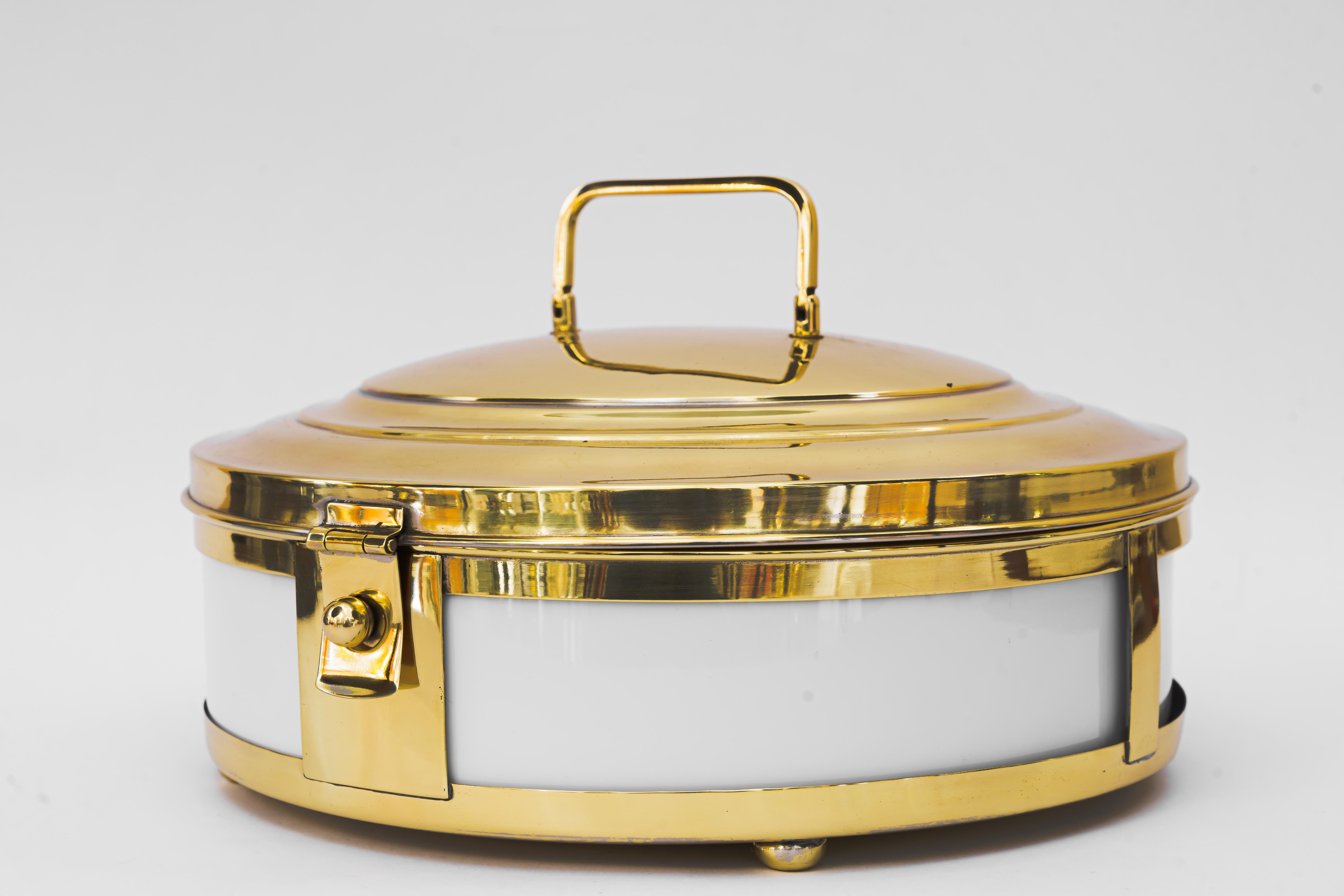Rare bread box vienna around 1920s.
Brass polished and stove enameled.
Original opal glass inside.