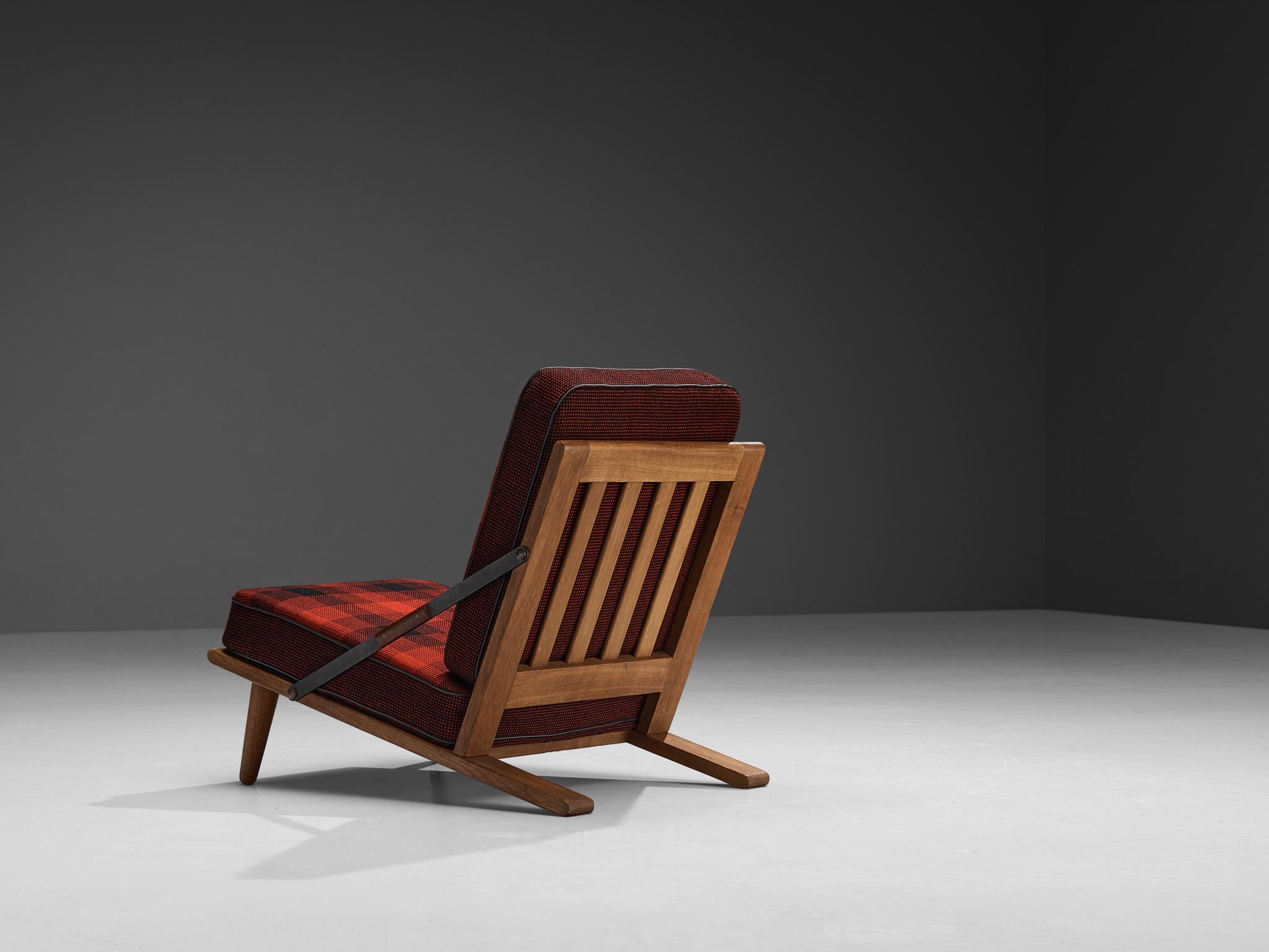 Rare Børge Mogensen for Andreas Graversen, easy chair, original tartan wool from the Cotil Collection, oak, teak, metal, Denmark, 1954 

This early edition lounge chair is designed by one of Denmark's masters of mid-century design; Børge Mogensen.