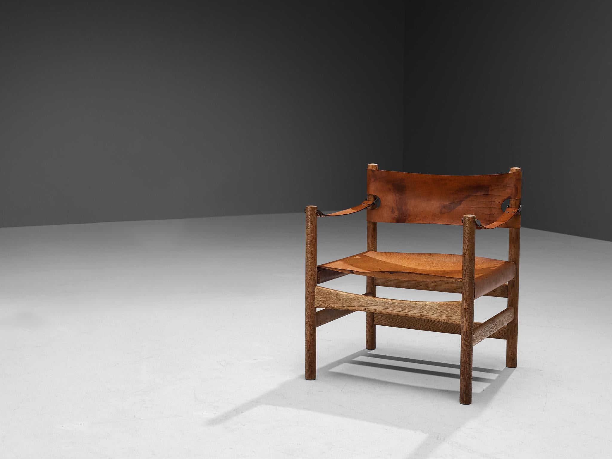 Børge Mogensen for Fredericia Stolefabrik, ‘Safari’ armchair model 2221, saddle leather, oak, brass, Denmark, 1960s

This rare armchair reminds of the classical foldable 'director-chairs', yet this design by Danish designer Børge Mogensen