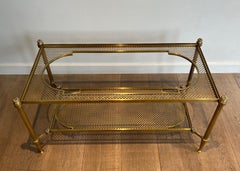 Seltener Couchtisch aus Bronze und Messing mit zwei Etagen und Glasplatte, die auf einer Messingplatte ruht