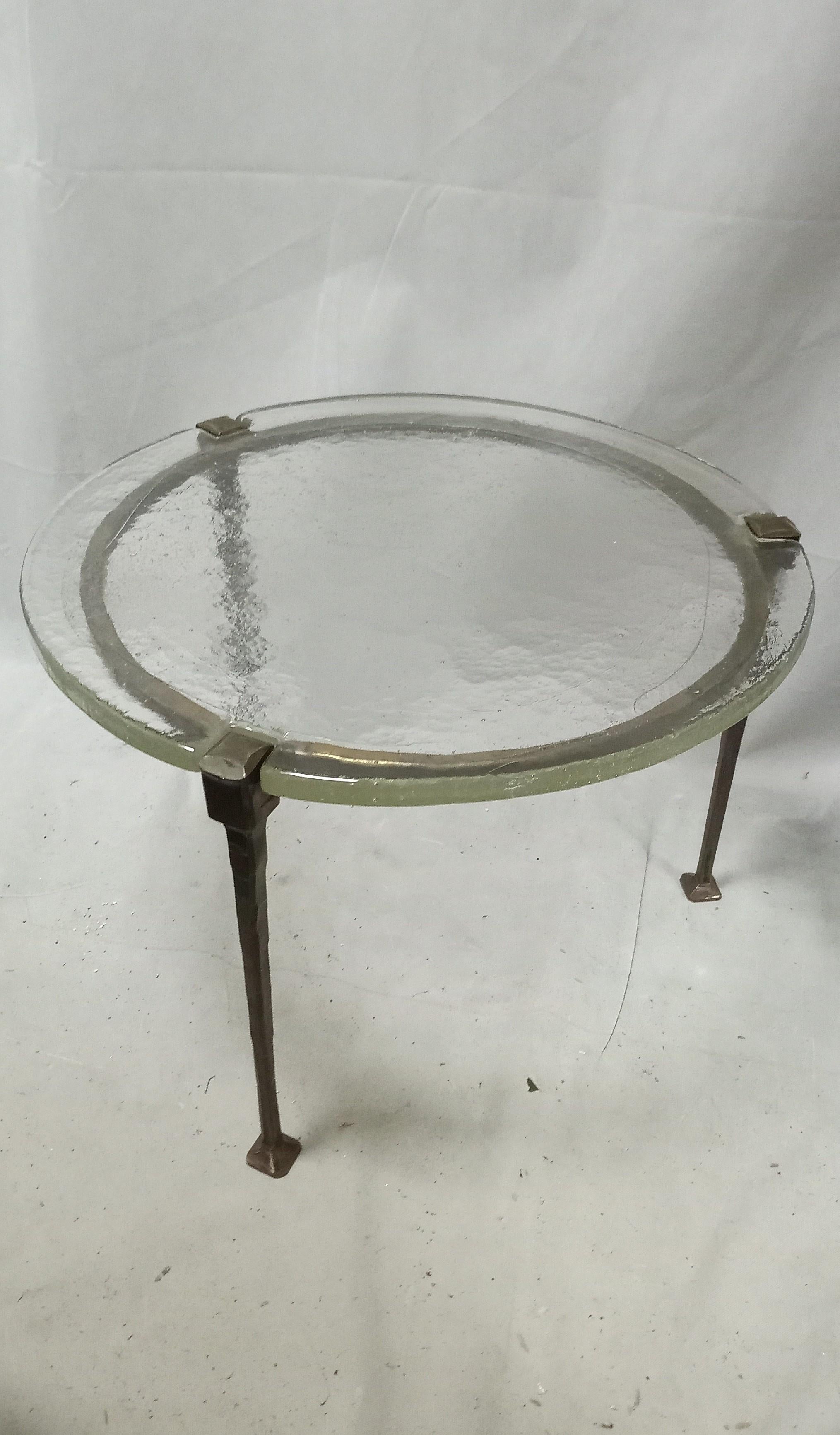 Beautiful round coffeetable  in bronze and crystalglass by Lothar Klute in good condition.