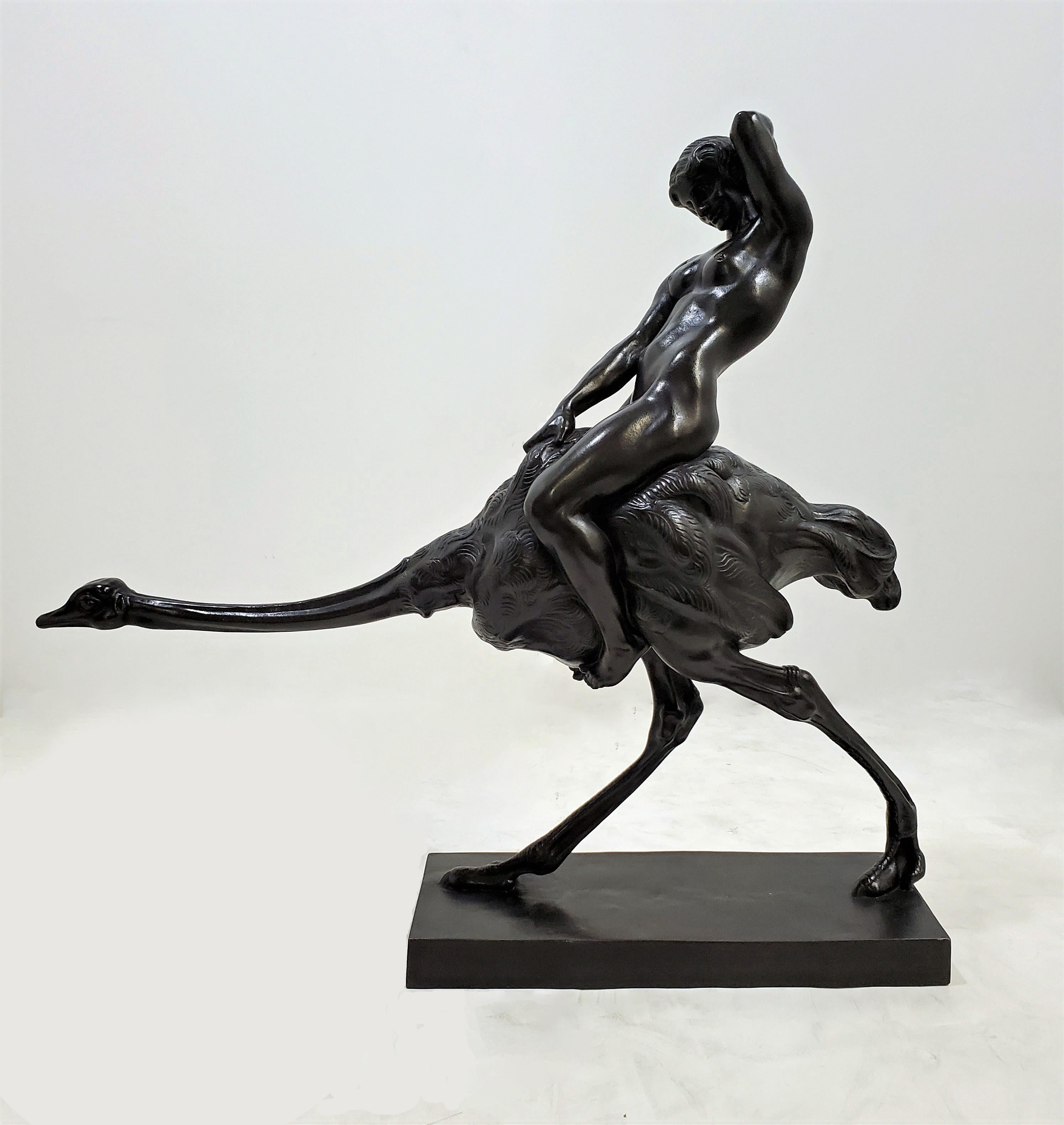 A large and rare bronze sculpture by Ferdinand Liebermann 1883–1941, of a female nude riding an ostrich running with neck outstretched. 
The whimsical bird is naturally portrayed, flightless but with great speed and powerful legs. The erotic