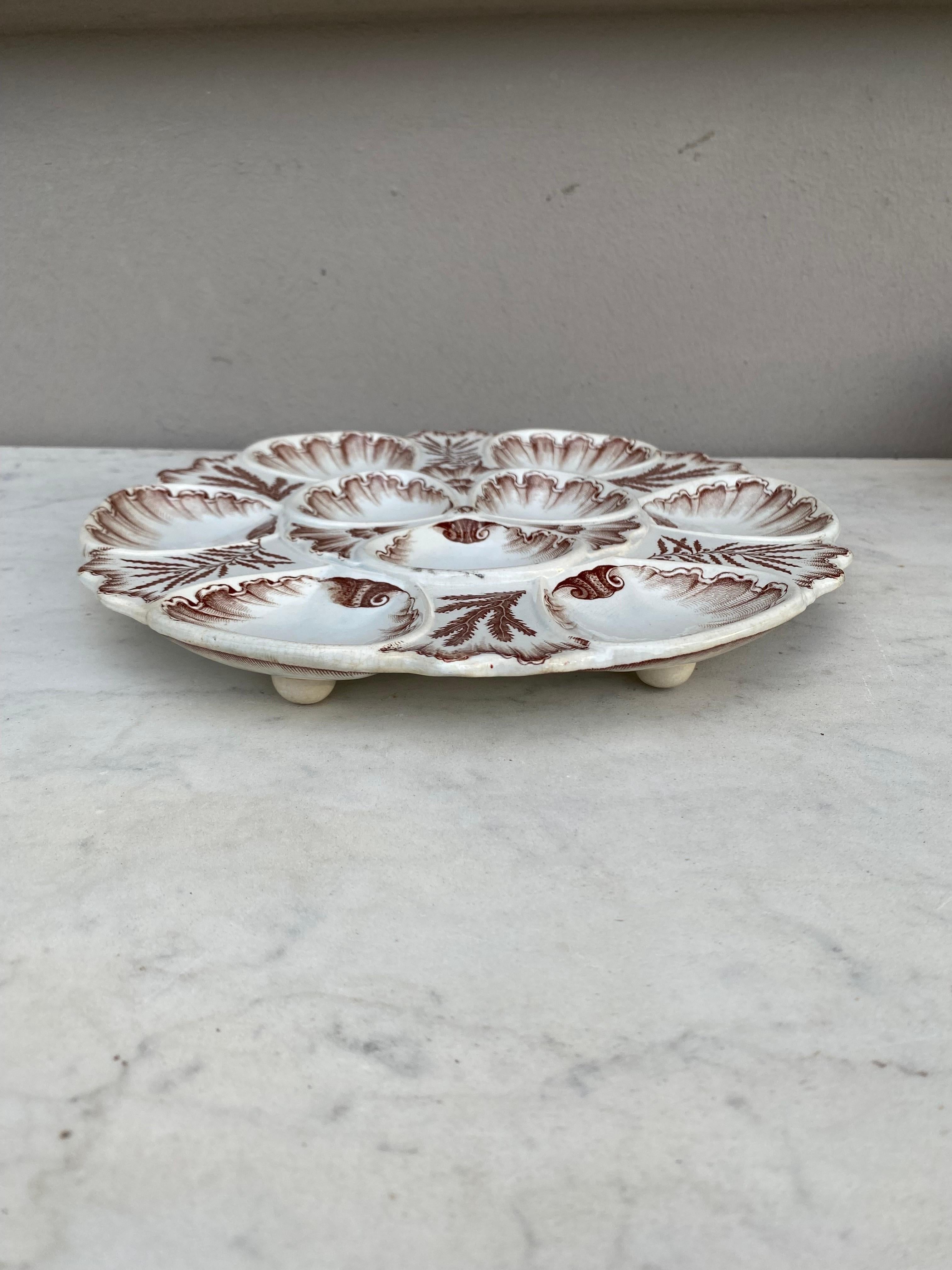 Rare brown 19th faience oyster plate signed Vieillard Bordeaux usually found in blue in white.