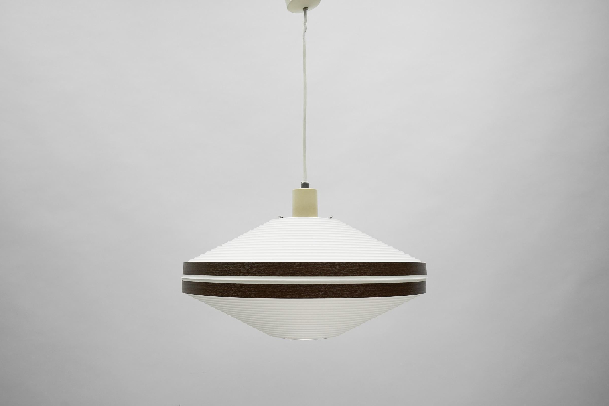 Ceiling Lamp by Aloys F. Gangkofner for Erco Leuchten, Germany Lüdenscheid 1960s.

A very interesting and decorative lamp. 

1 x E27 Edison screw fit bulb holder, is rewired and in working condition. It runs both on 110/230 Volt.
