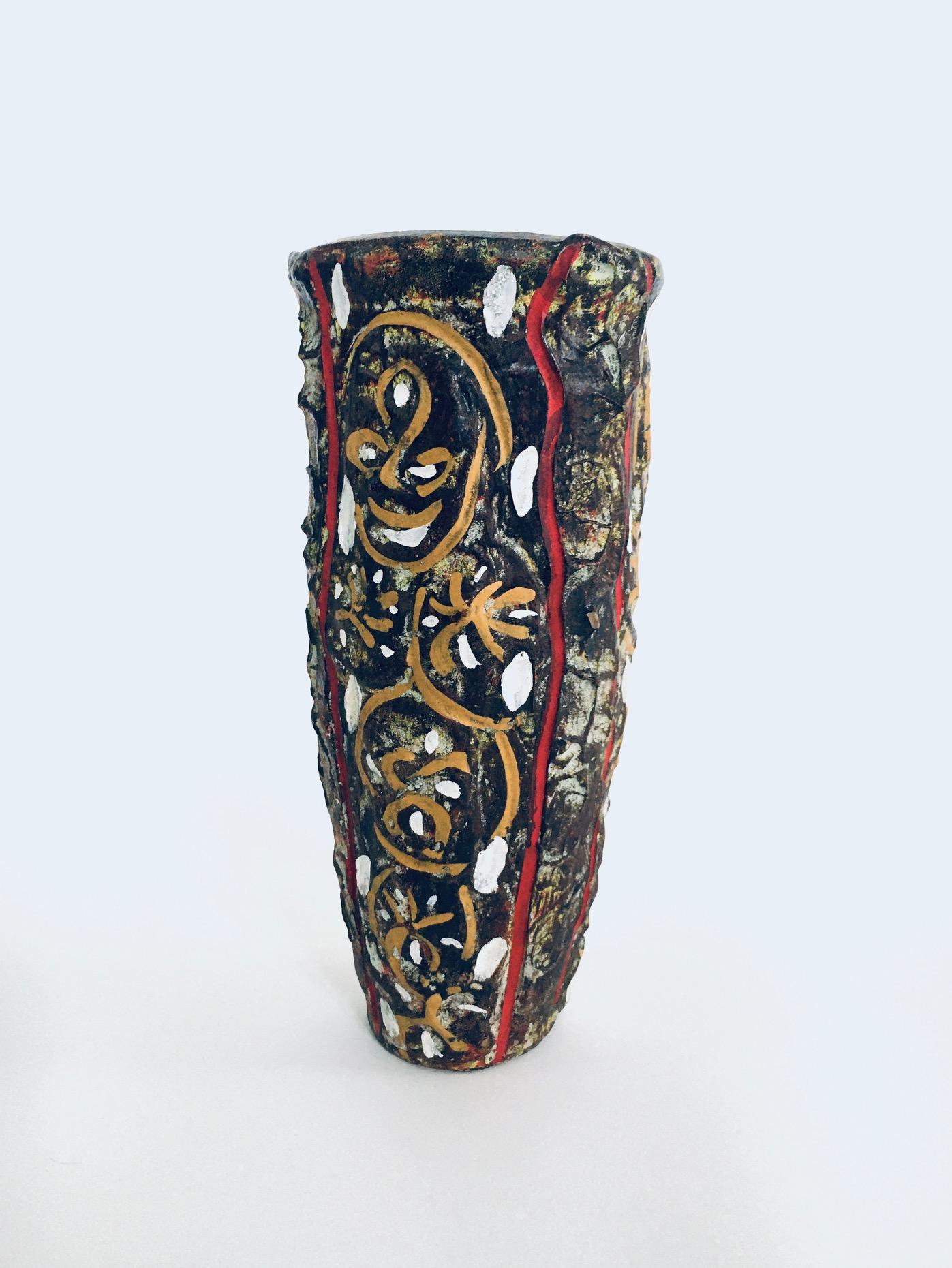 Vintage RARE Brutalist Design Art Pottery Studio Painted Vase. Made in Belgium, 1960's period. No markings of the artist on this vase. Multicolored painted brutalist shaped vase that's reminiscent of African Art Culture. This vase comes in good