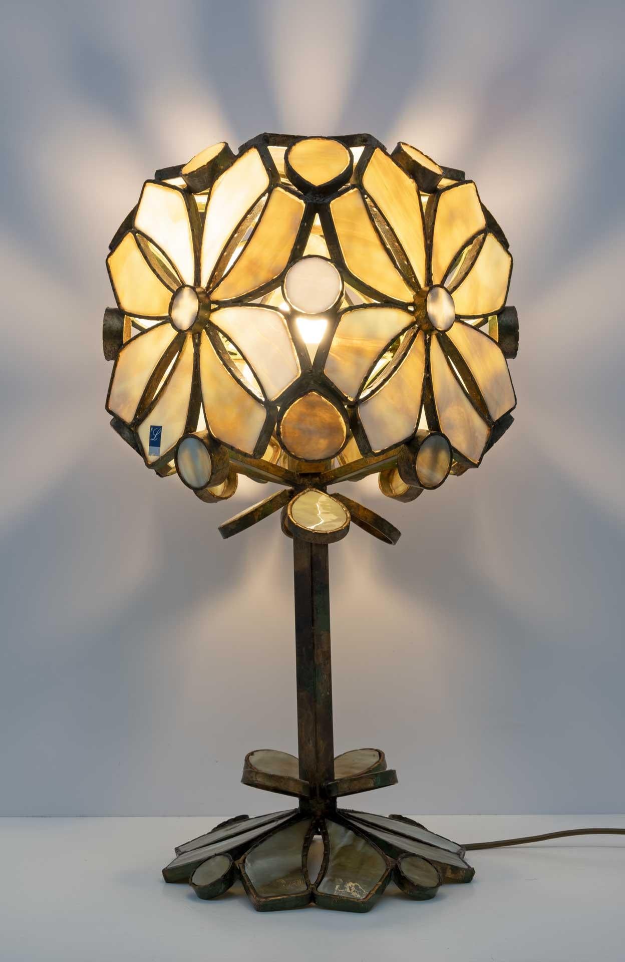 Rare Murano glass table lamp designed and made by Longobard in 1970. The structure is in hand-crafted gilded wrought iron with the insertion of colored glass paste. Original logo, first production.