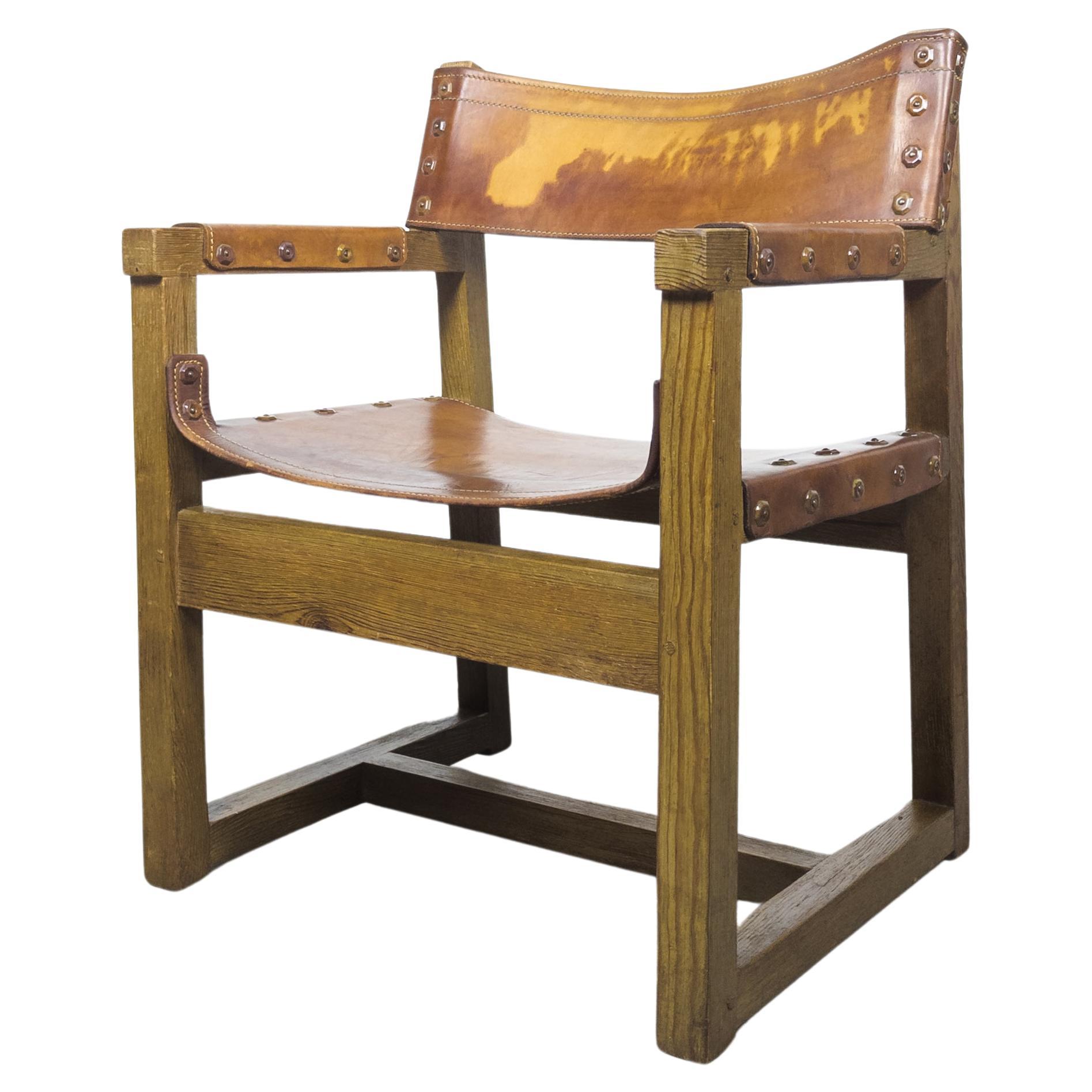 Rare brutalist leather armchair by Biosca, Spain 1950s For Sale