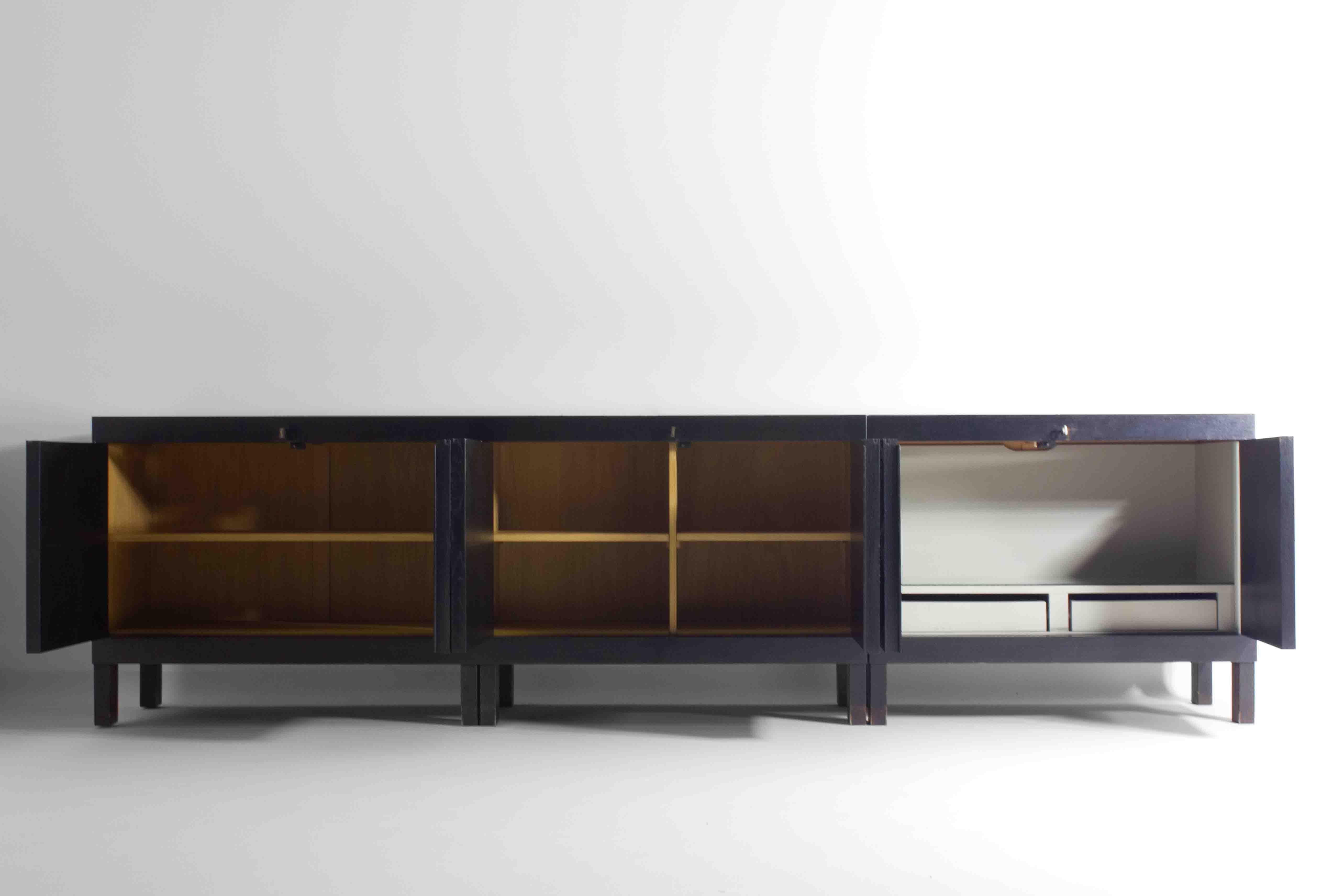 This brutalist sideboard, designed by Jean Batenburg for MI in Belgium in 1969, is a remarkable and rare find. The sideboard immediately captures attention with its total of six optical art patterned doors that offer a striking visual depth, a