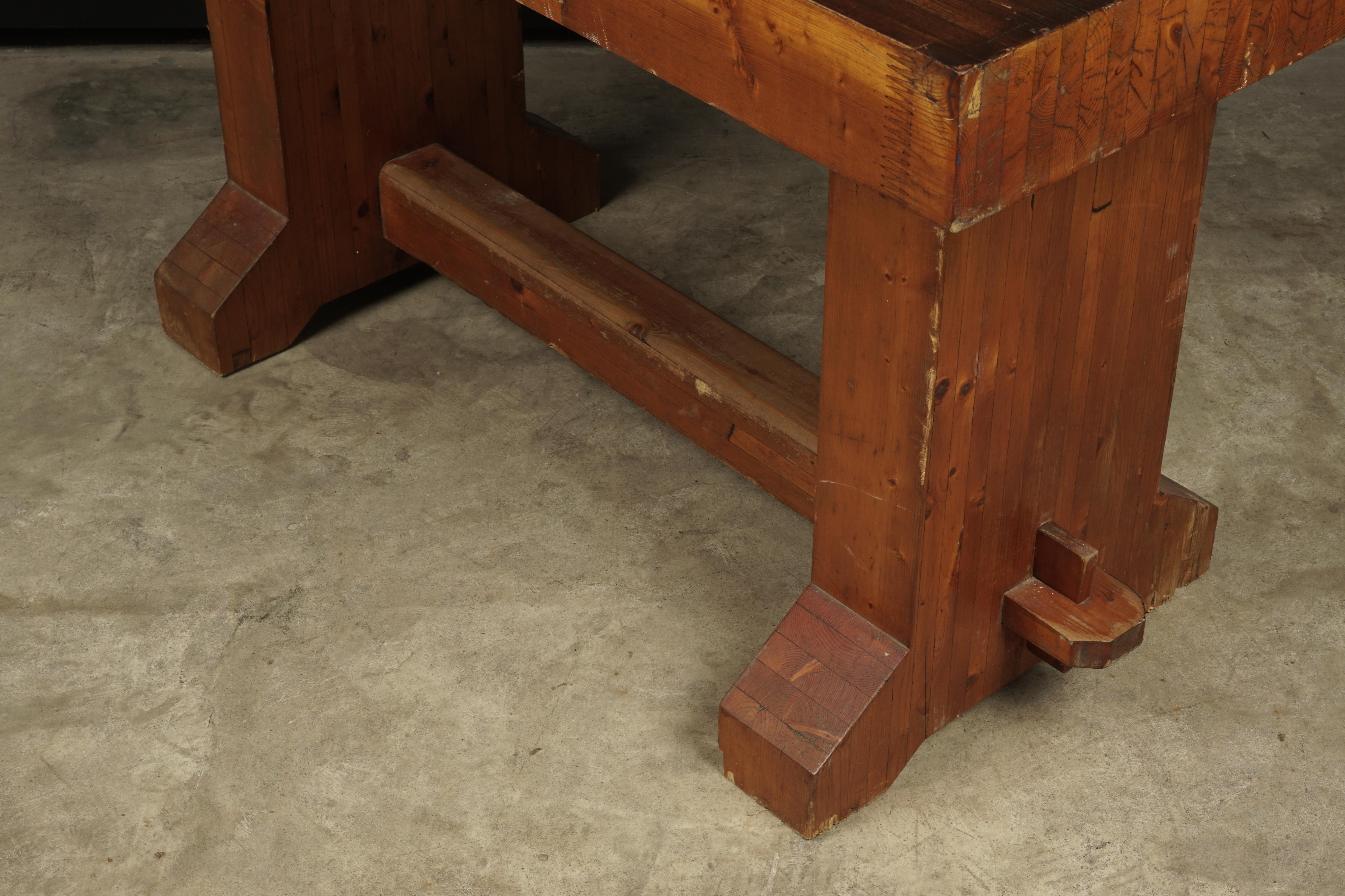 Rare brutalist table from France, 1960s. Solid stained pine construction with nice wear and patina. Very unusual model.