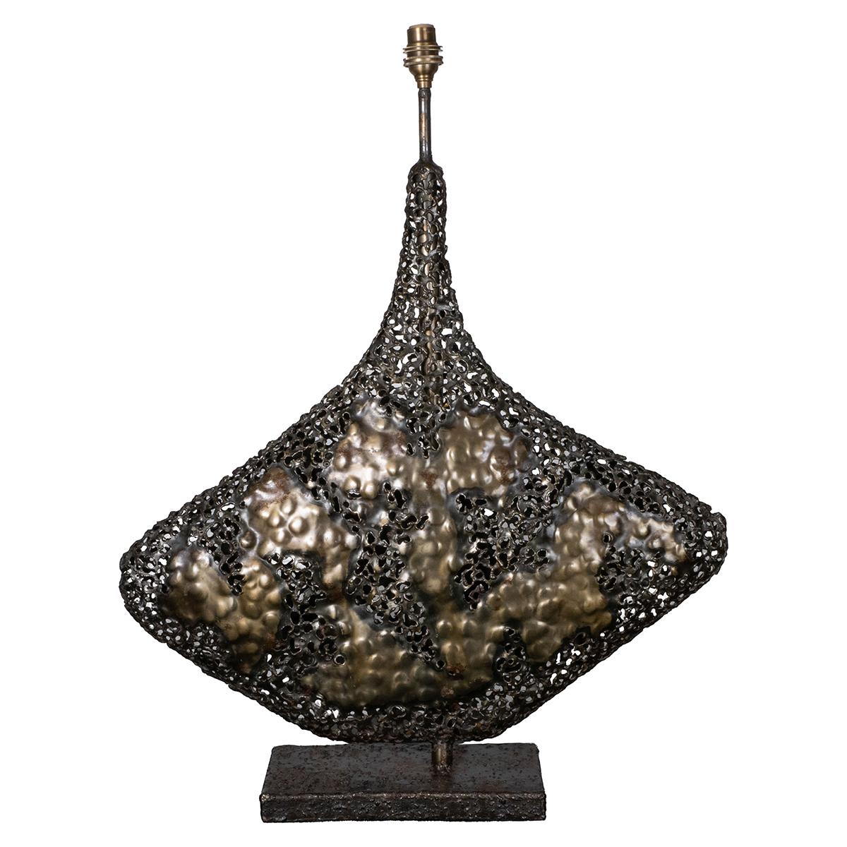Rare single brutalist style pierced metal table lamp by Fantoni.