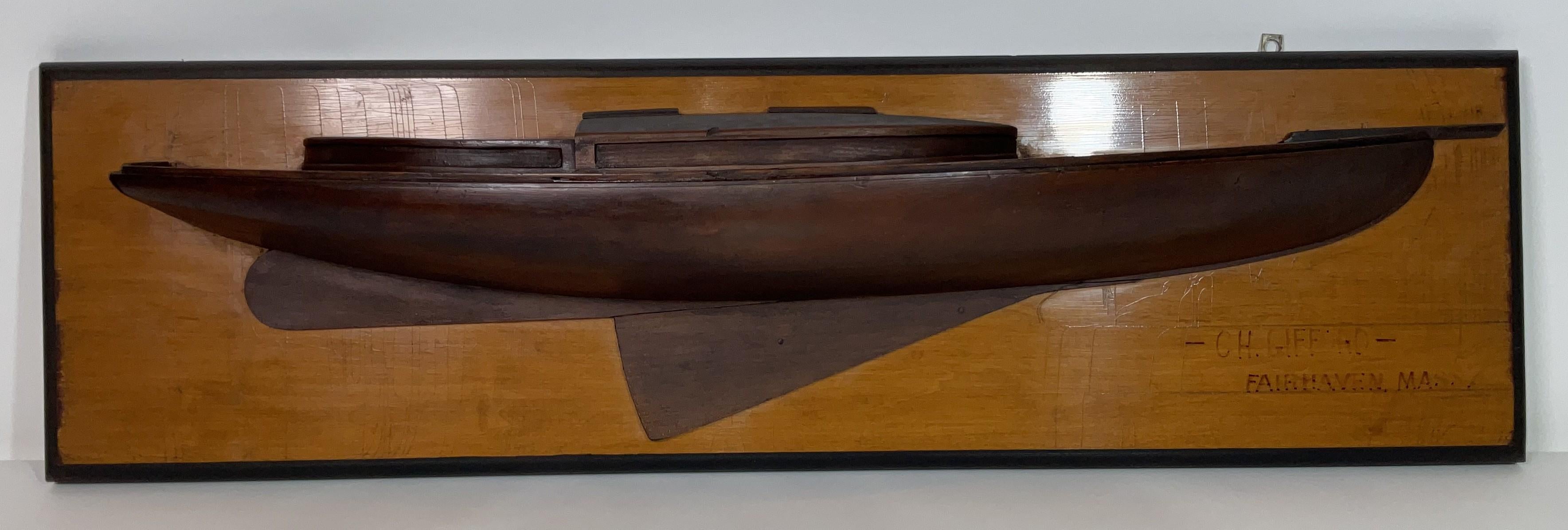 Very rare drop centerboard sloop builder’s model by famous oil on canvas artist Charles Henry Gifford. The sleek design shows great talent. Beautiful form. Choice patina. Top piece of Americana.

Weight:    13 lbs.
Overall Dimensions:    10