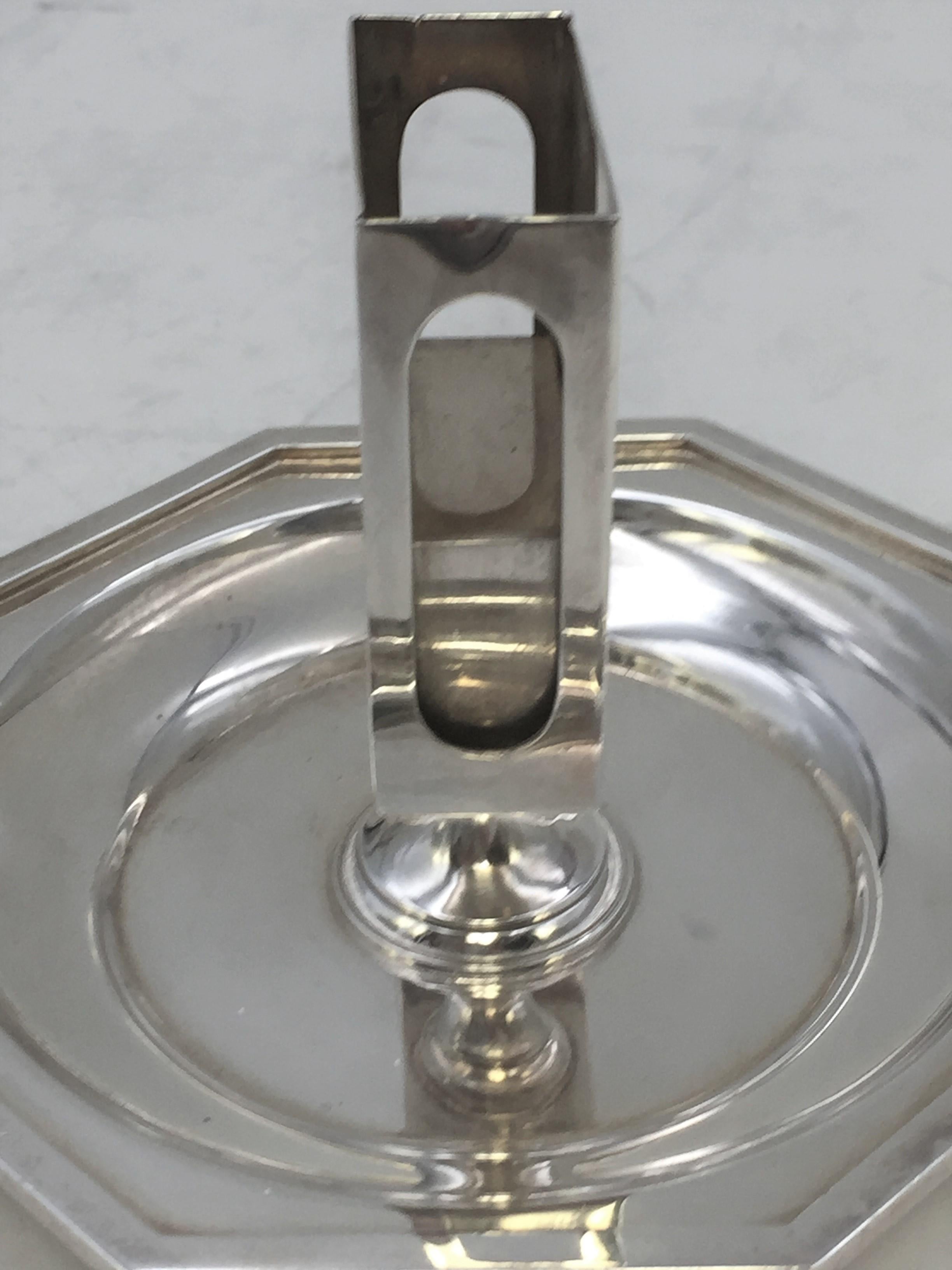 Bulgari sterling silver match striker (3 in height; 4 ¾ in diameter) with beautiful geometric hexagonal base. Extremely rare item because Bulgari typically makes items in gold and rarely makes items in sterling silver. Weighs 7.3 troy ounces.