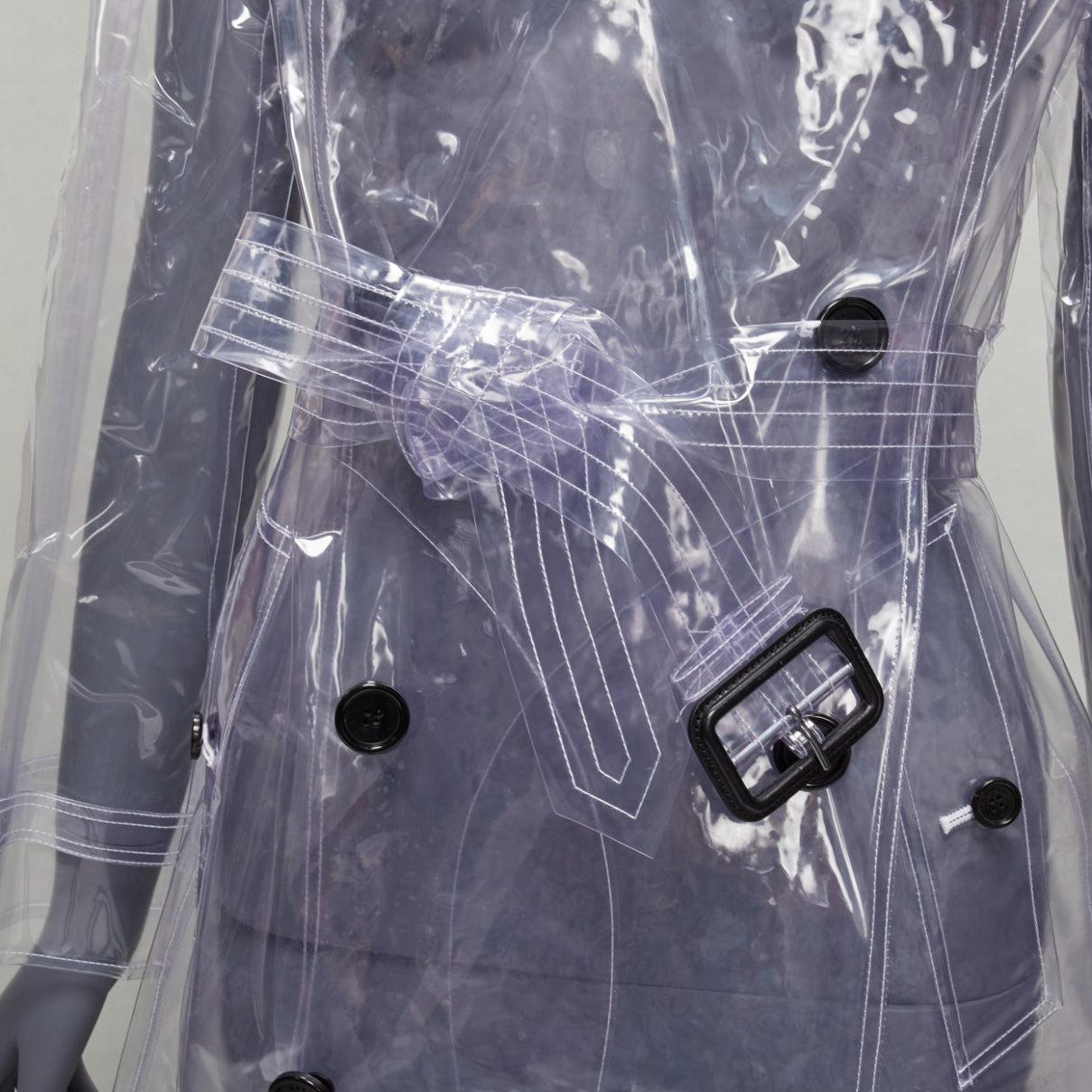 rare BURBERRY 2018 transparent clear PVC trench coat raincoat UK6 M
Reference: BSHW/A00007
Brand: Burberry
Designer: Christopher Bailey
Collection: SS 2018
Material: Plastic
Color: Clear
Pattern: Solid
Closure: Button
Extra Details: Burberry logo