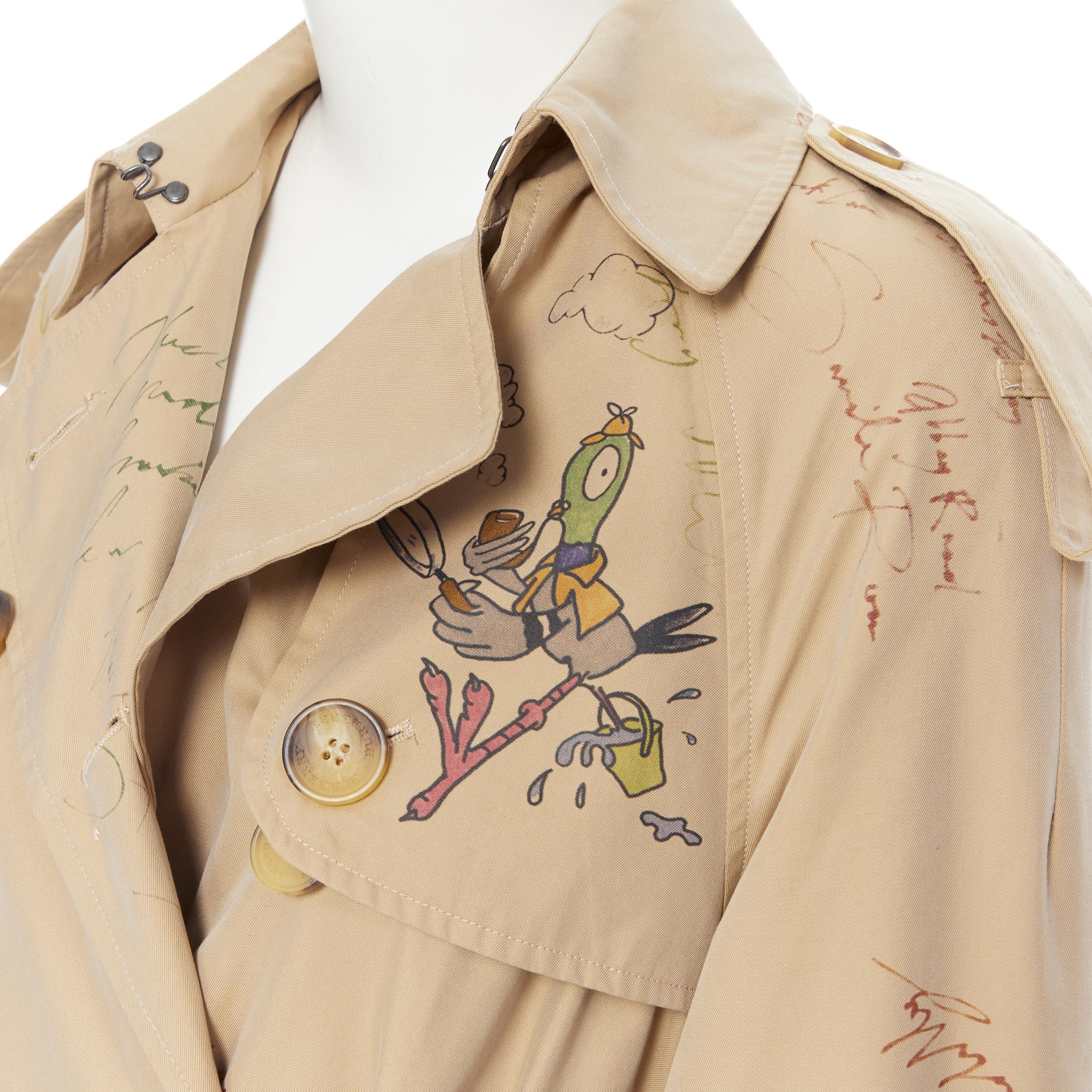 rare BURBERRY Sketch cartoon print House check Tropical Gabardine trench S 
Reference: TGAS/B00212 
Brand: Burberry 
Material: Cotton 
Color: Beige 
Pattern: Abstract 
Closure: Button 
Extra Detail: Double breasted front closure. Unique Sketch