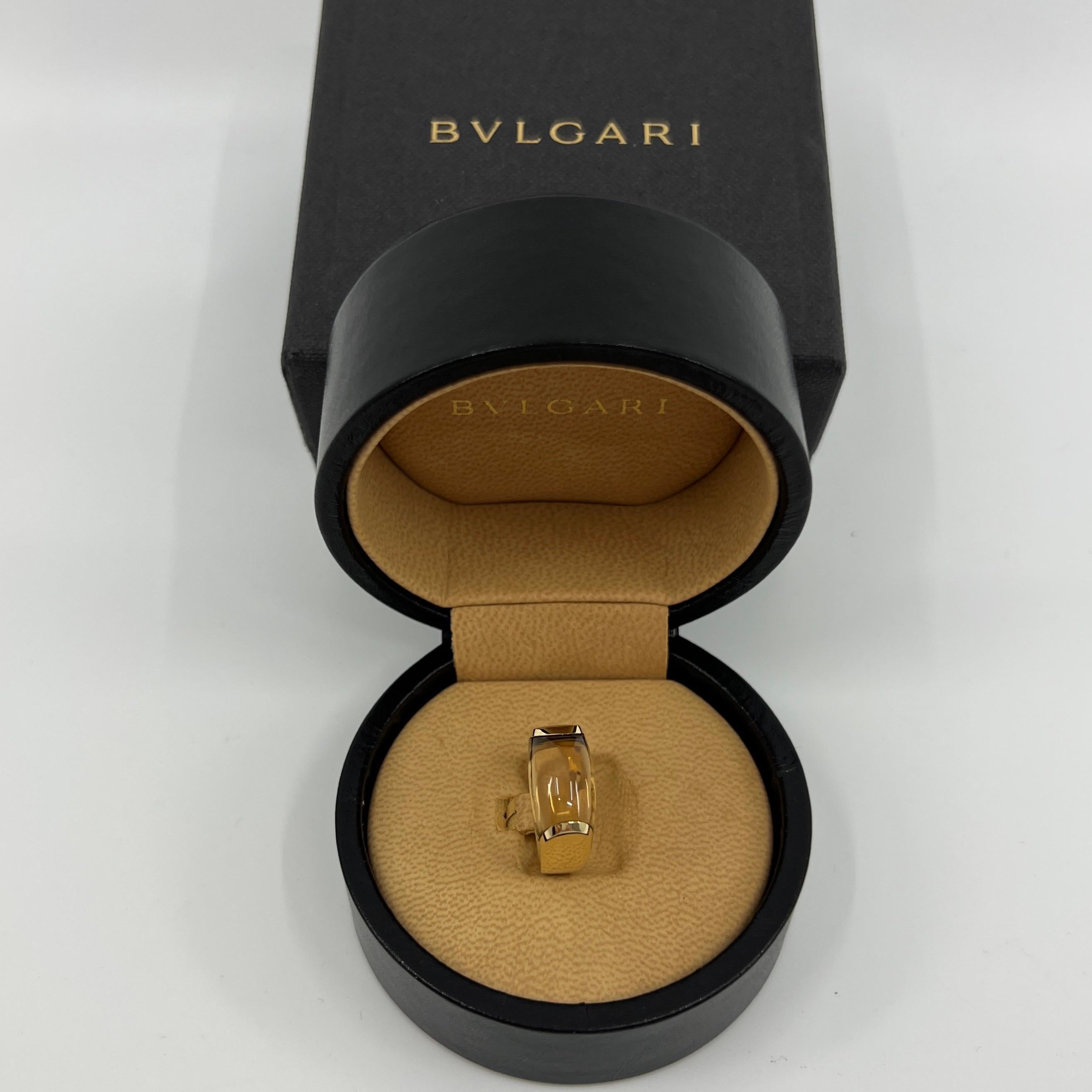 Rare Bvlgari Vivid Yellow Citrine Tronchetto 18k Yellow Gold Ring.

Beautiful domed yellow citrine set in a fine 18k yellow gold tension set ring.

In excellent condition, has been professionally polished and cleaned. Some very light marks and