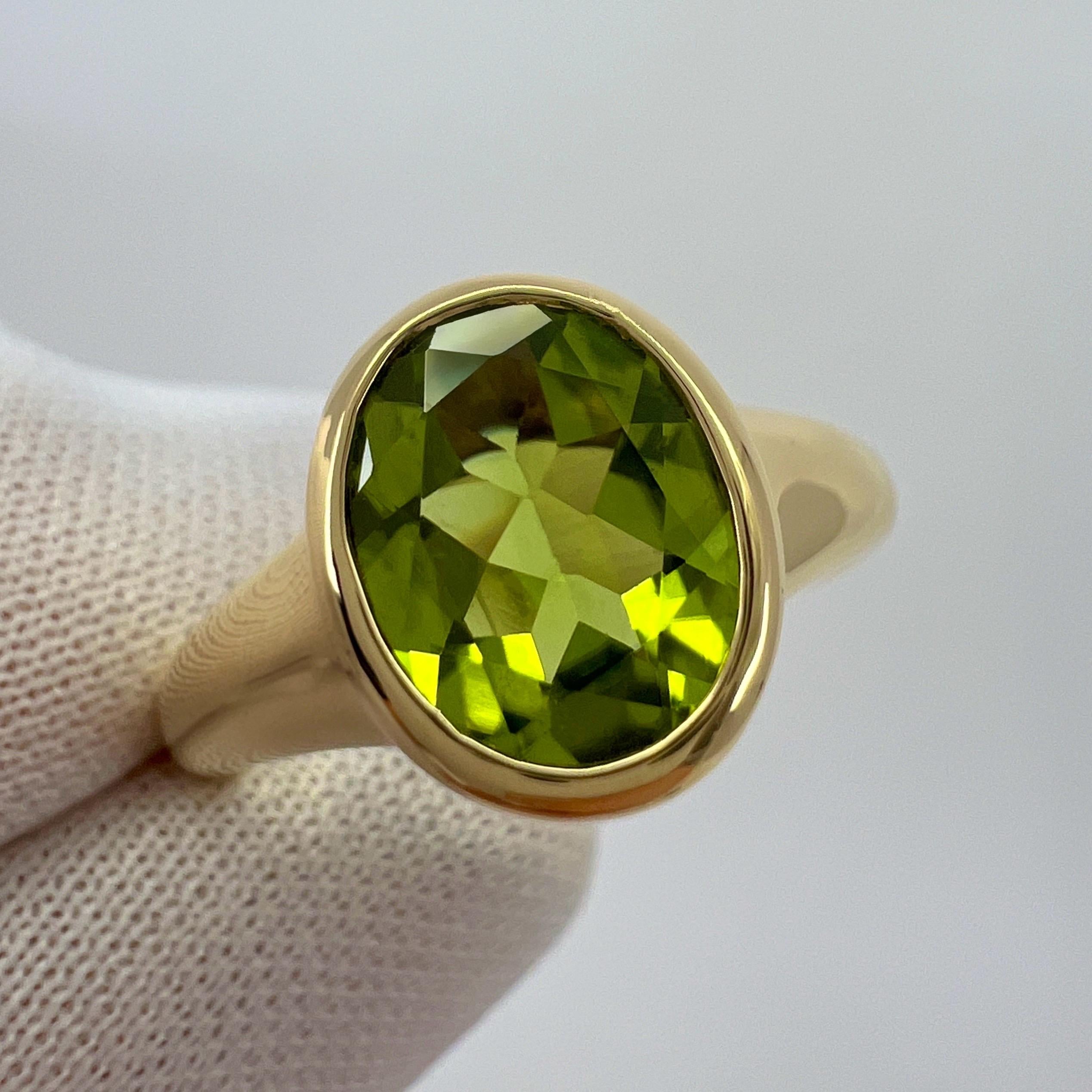 Rare Bvlgari Green Peridot Oval 18k Yellow Gold Signet Style Bezel Rubover Ring For Sale 5