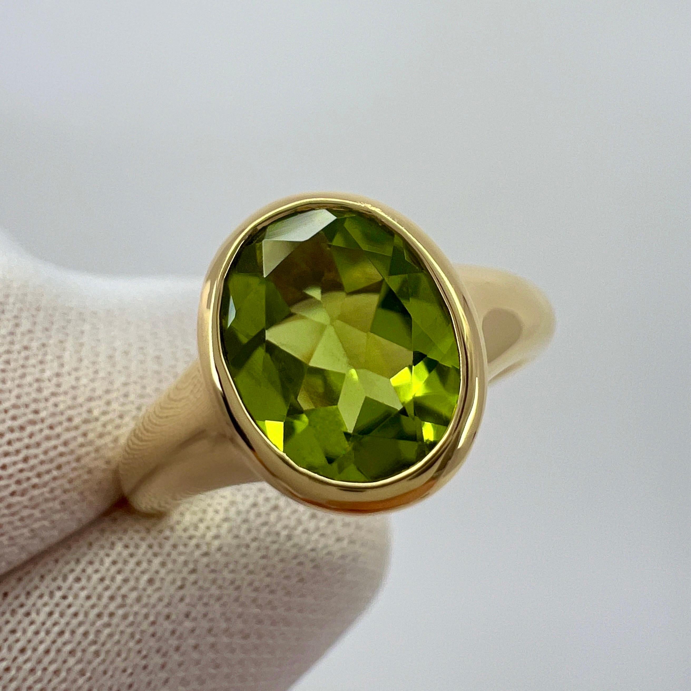 Rare Bvlgari Green Peridot Oval 18k Yellow Gold Signet Style Bezel Rubover Ring For Sale 6