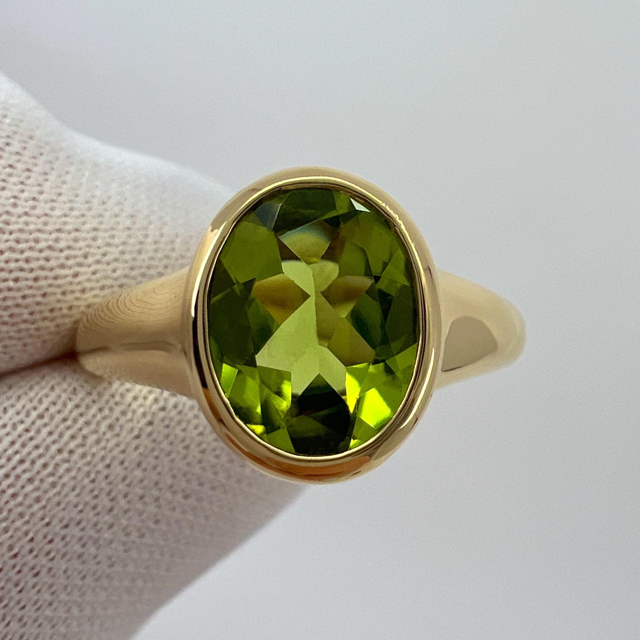 Vintage Bvlgari Oval Cut Peridot 18k Yellow Gold Signet Style Ring.

This rare Bvlgari pieces features a fine oval cut green peridot set in a fine 18k yellow gold ring. 
Gemstone measures 10x8mm with excellent colour and clarity. Fine jewellery