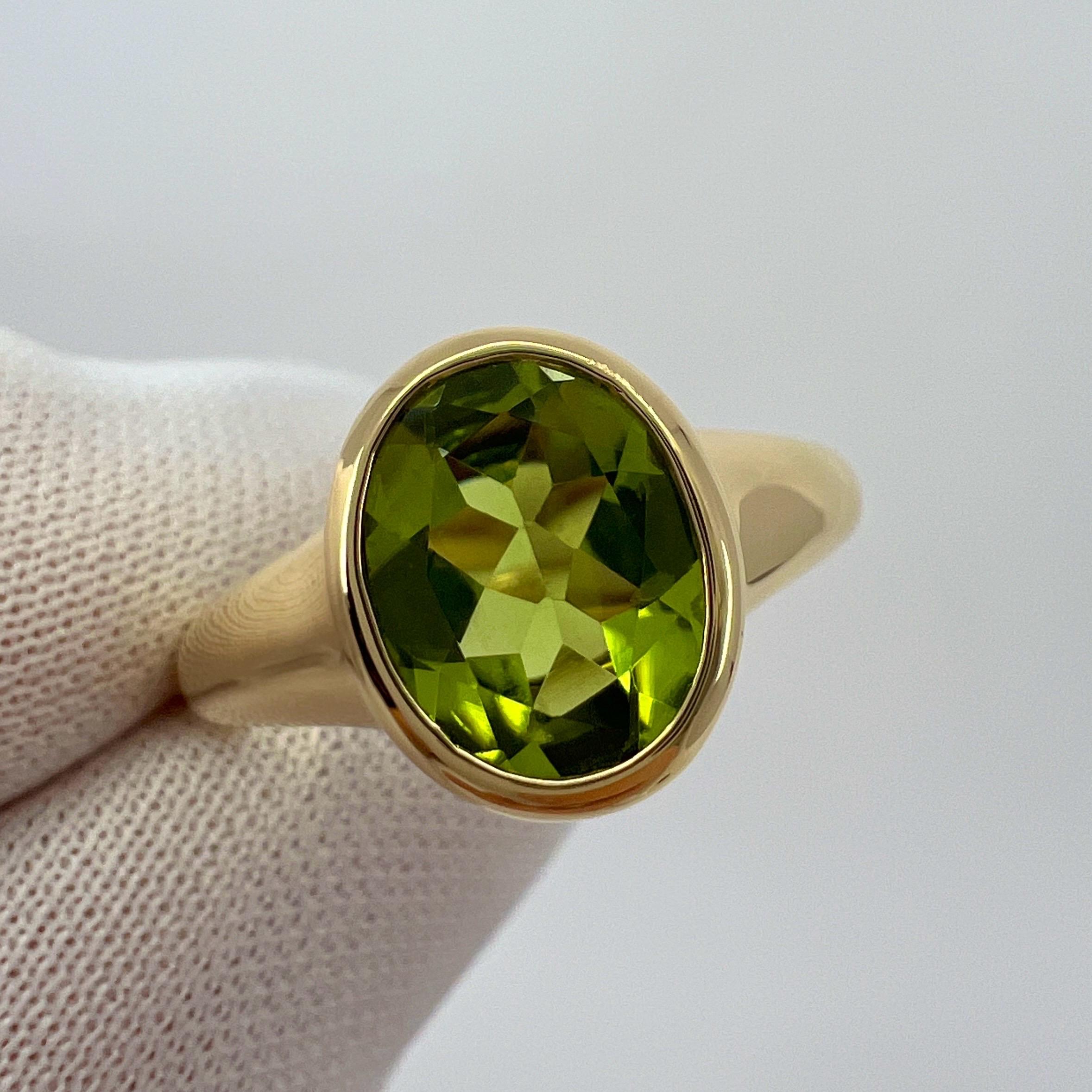 Rare Bvlgari Green Peridot Oval 18k Yellow Gold Signet Style Bezel Rubover Ring In Excellent Condition For Sale In Birmingham, GB