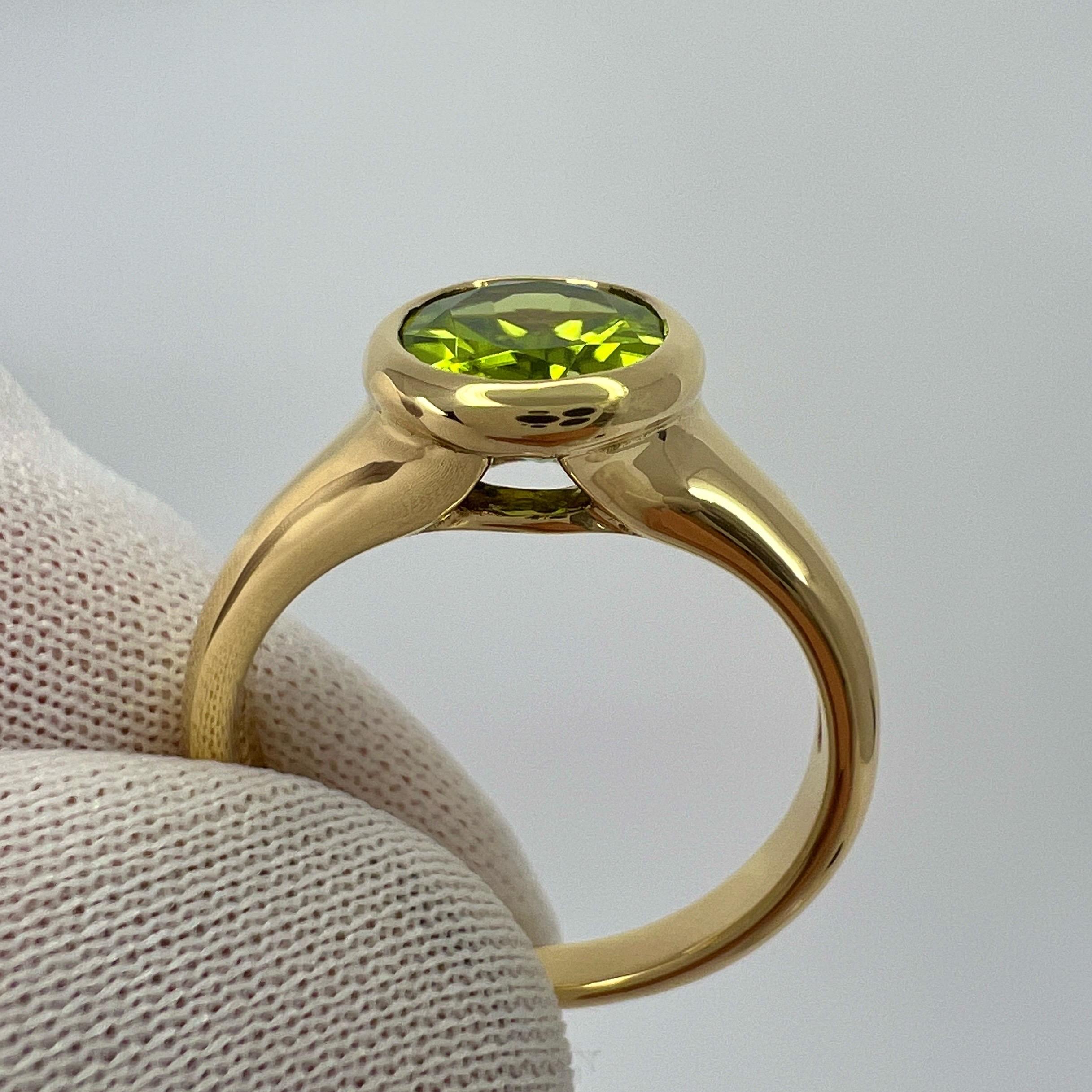 Rare Bvlgari Green Peridot Oval 18k Yellow Gold Signet Style Bezel Rubover Ring For Sale 2