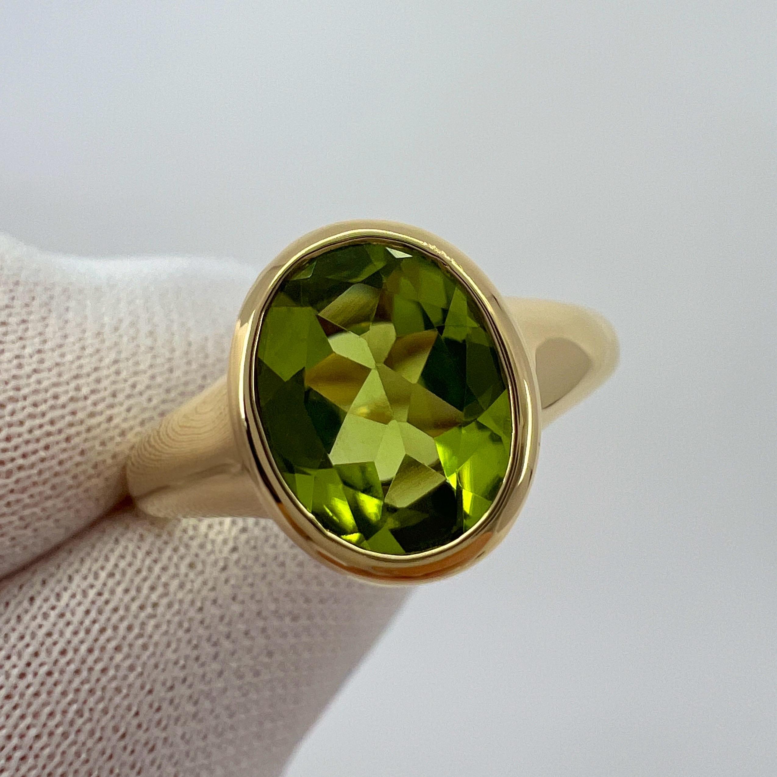 Rare Bvlgari Green Peridot Oval 18k Yellow Gold Signet Style Bezel Rubover Ring For Sale 3
